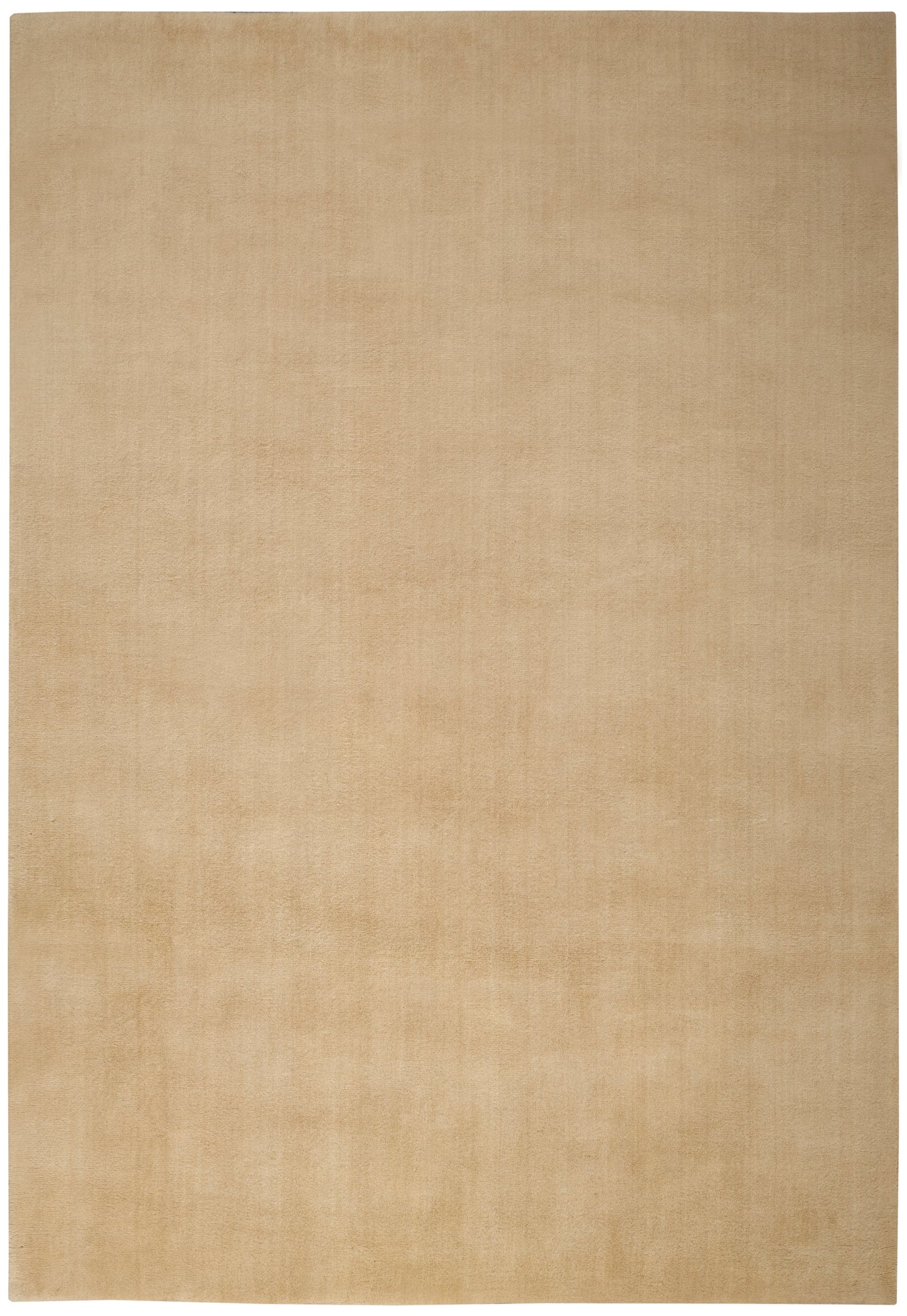 Light tan rectangular rug with subtle texture and soft, matte finish.