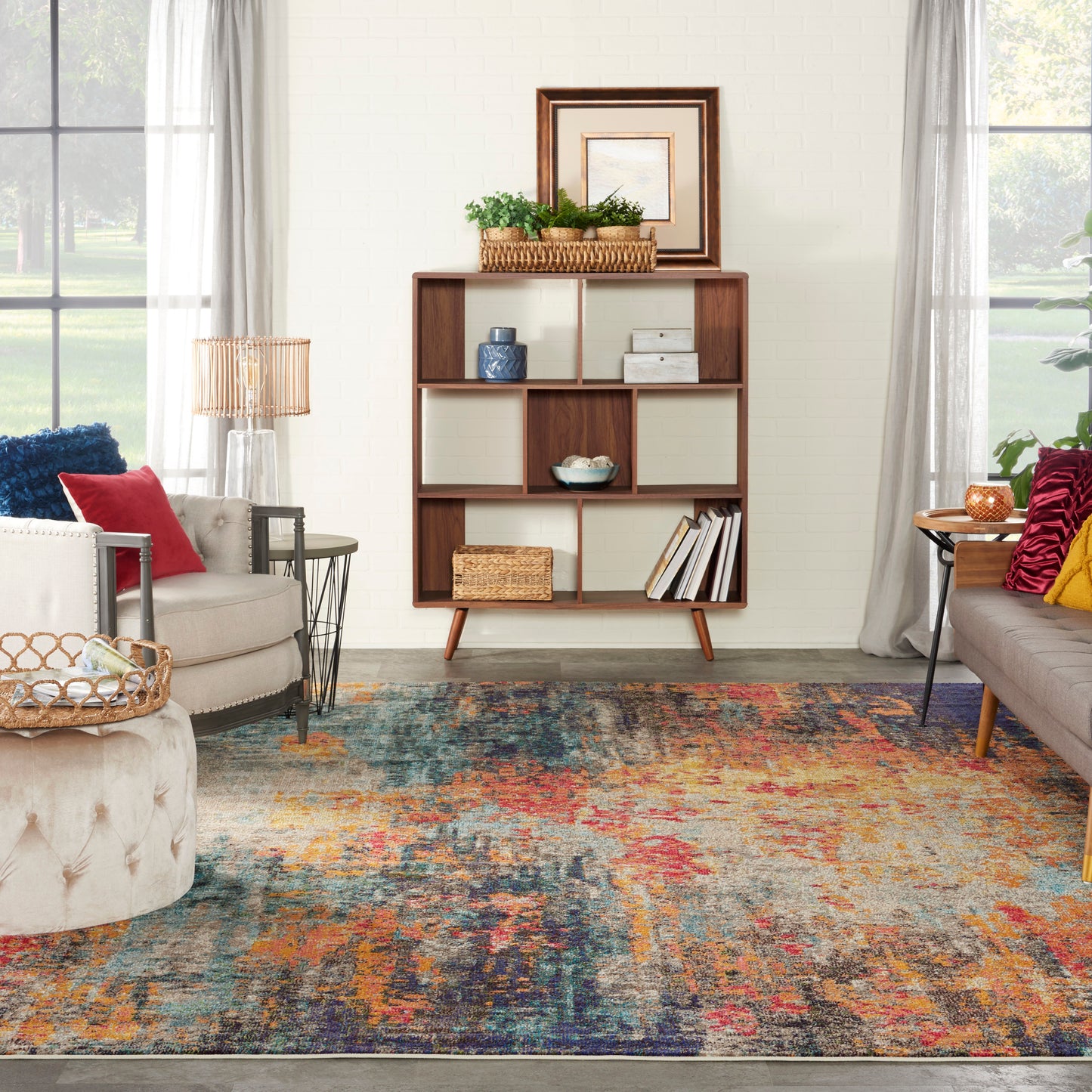 Modern multicolor abstract rug on living room floor.