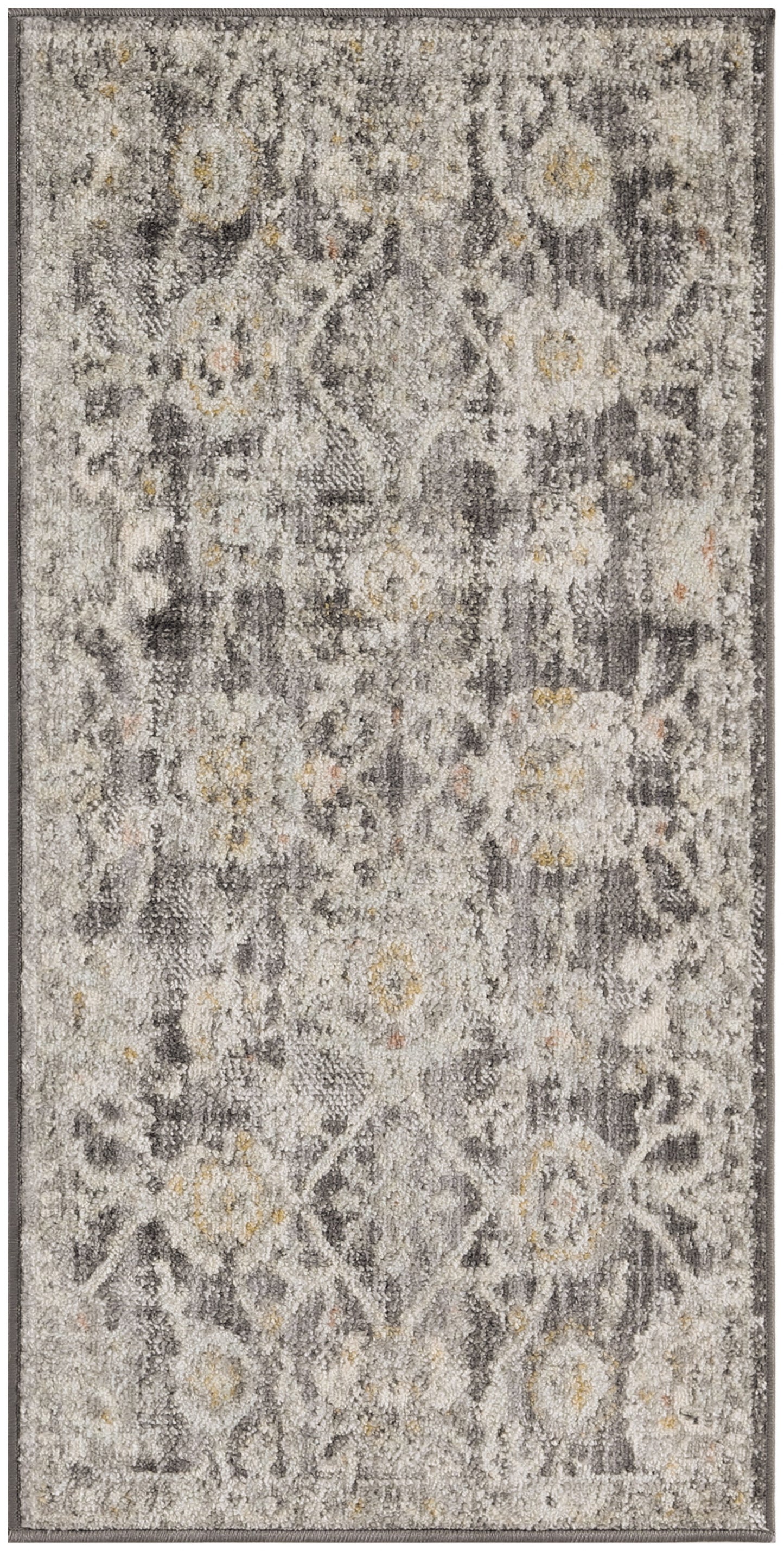 Grey & ivory patterned area rug with subtle floral motifs & yellow accent flecks.