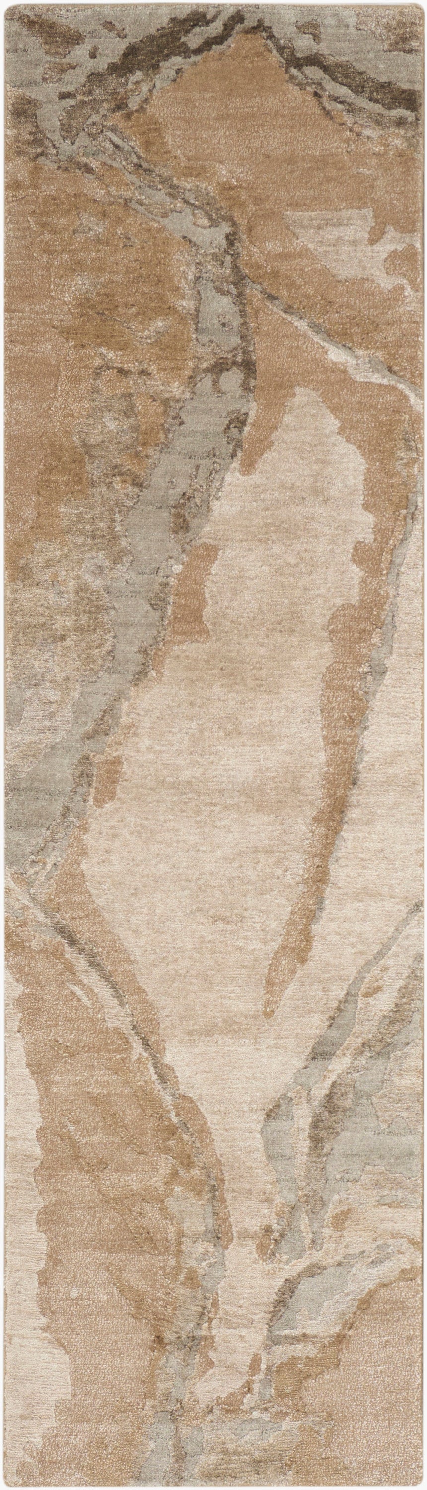 Rectangular area rug with tan, beige and gray marbled abstract pattern; soft woven texture.