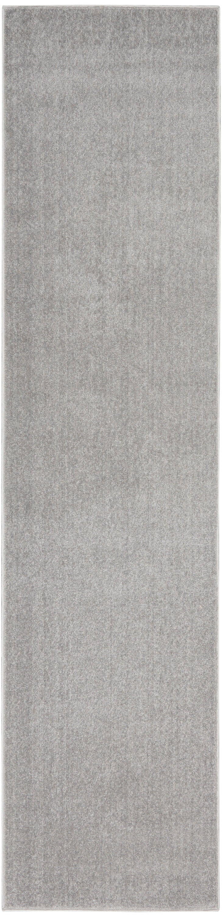 Grey outdoor rug runner, rectangular with soft plush pile; 12' long, suitable for outdoor pathways or patios.