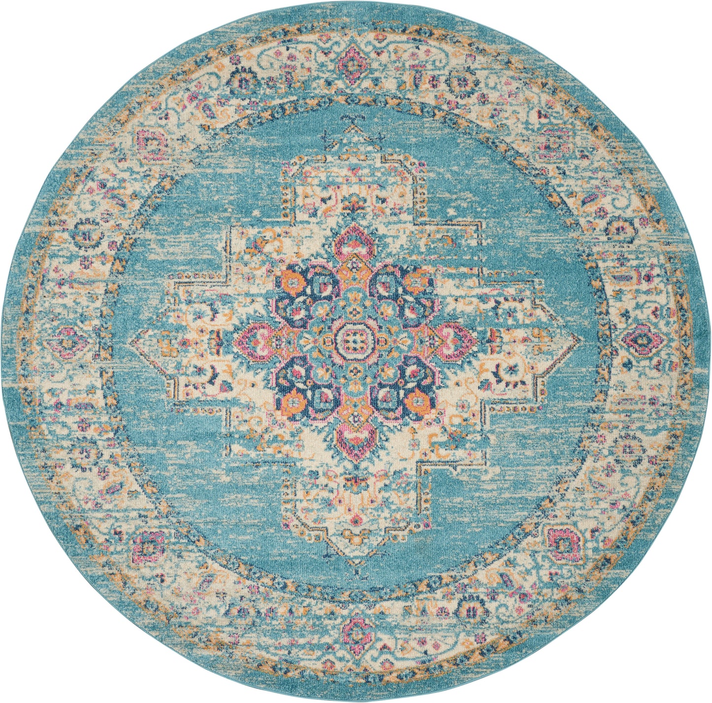 Round turquoise rug with a vintage distressed pattern and an intricate central medallion in blues, pinks, and creams.