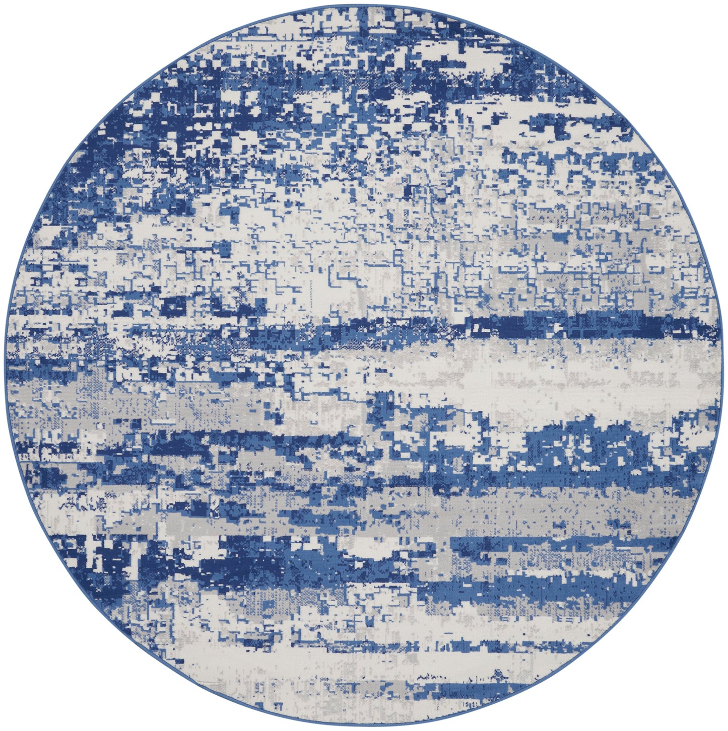 Round rug with abstract blue and ivory pattern, coastal watercolor-style design.