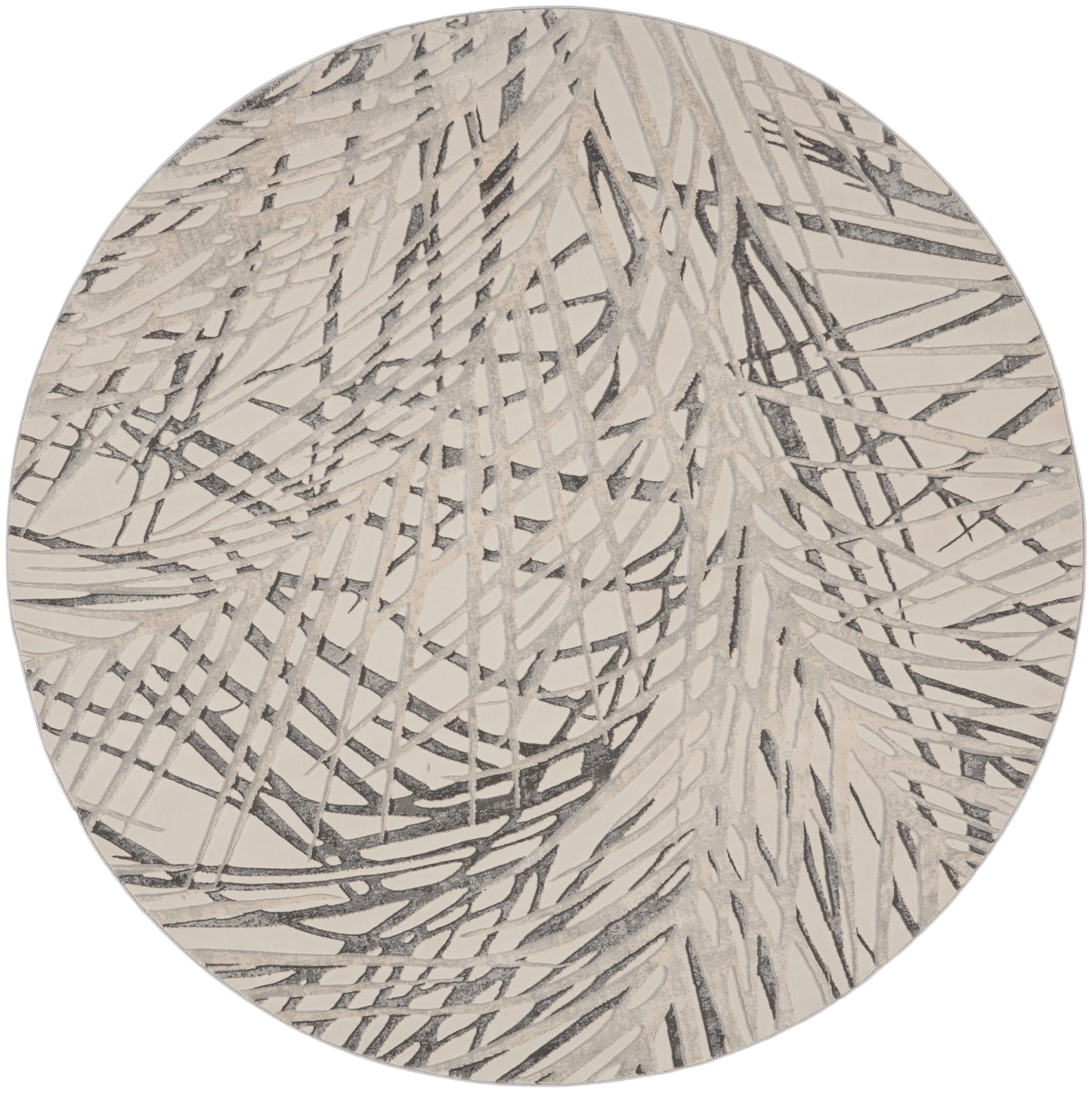 Round beige rug with charcoal abstract linear scribble pattern; modern decor.