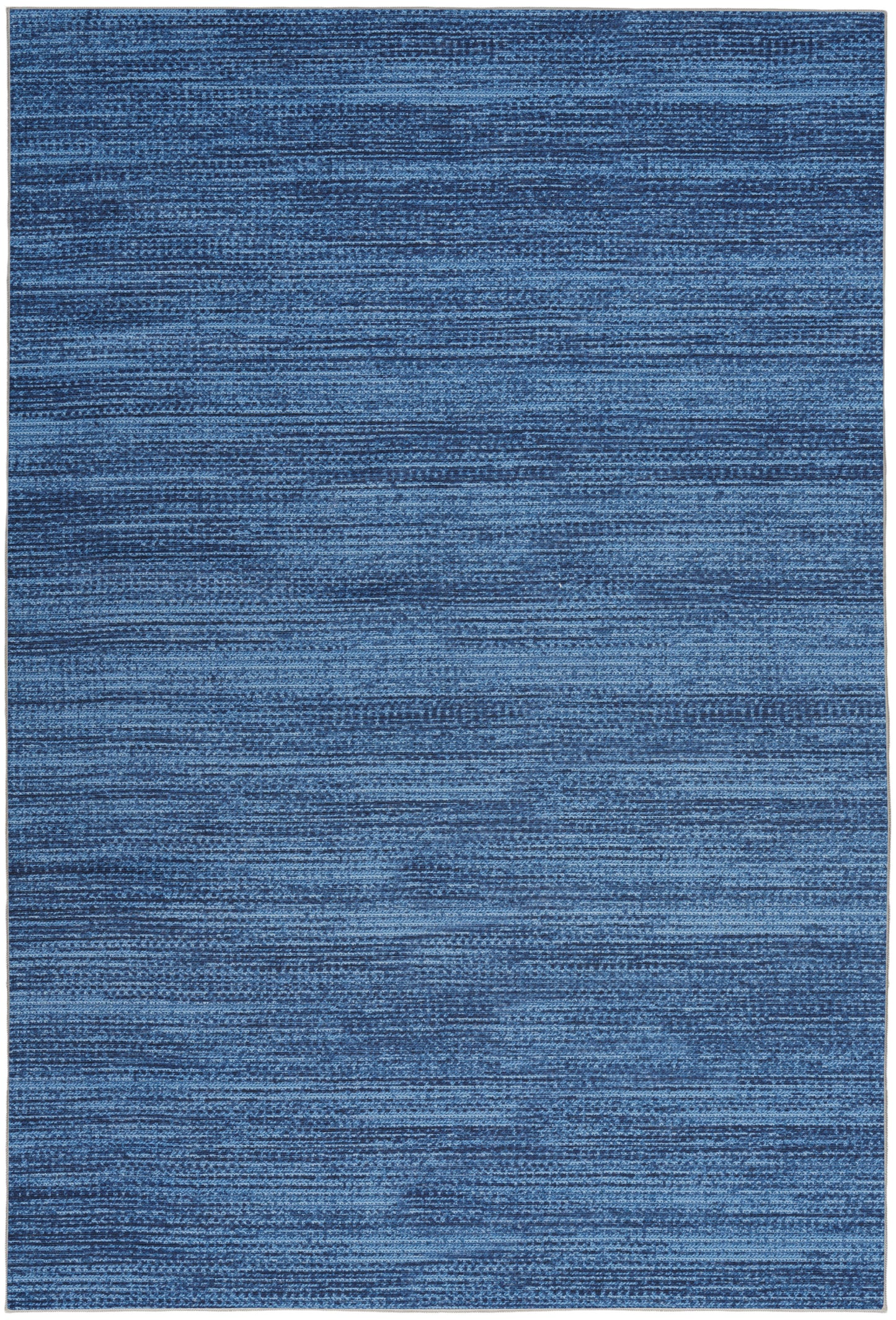 Rectangular blue woven rug with variegated indigo tones and subtle horizontal stripes.