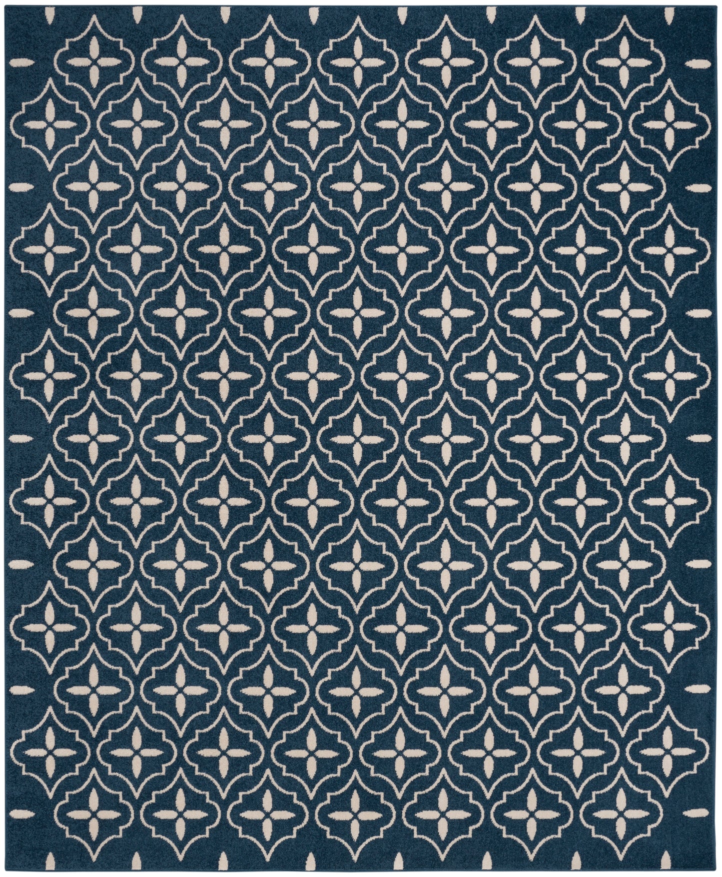 Teal-blue rug with a repeating white quatrefoil lattice pattern; rectangular floor rug.