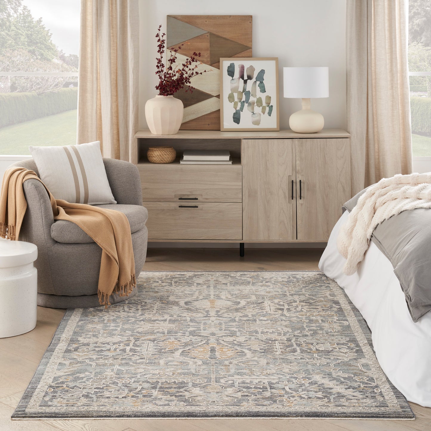 Neutral-toned patterned rug in a living room setting