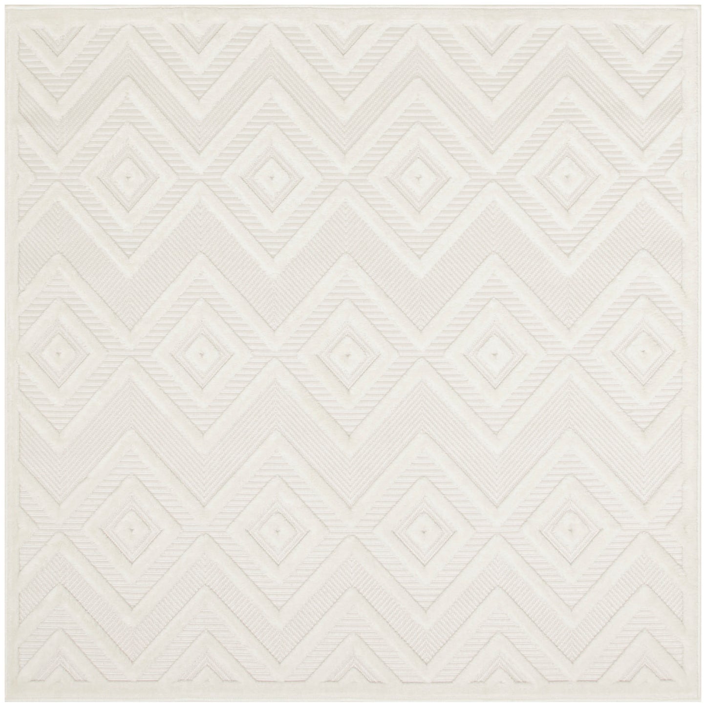 Cream square rug with raised diamond and chevron geometric pattern; soft textured surface.