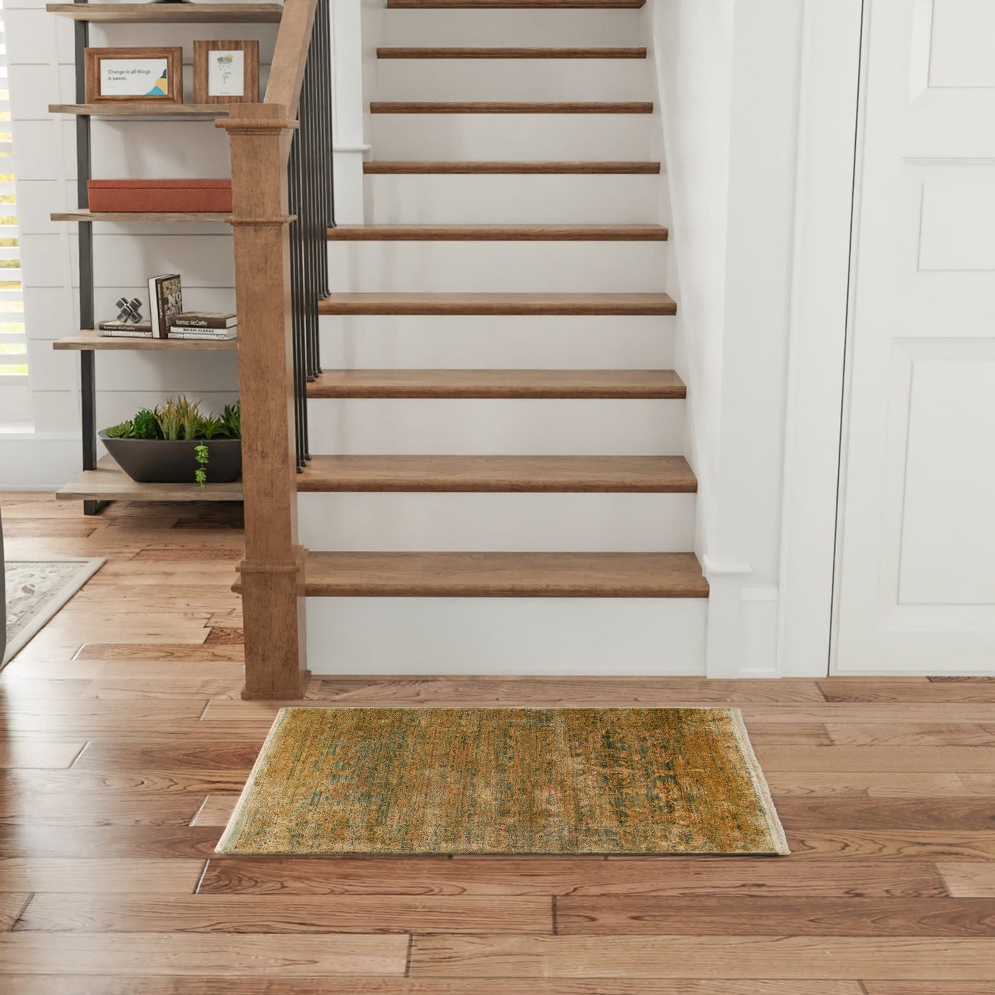 Multicolor vintage rug on hardwood floor, size 2' x 3'.