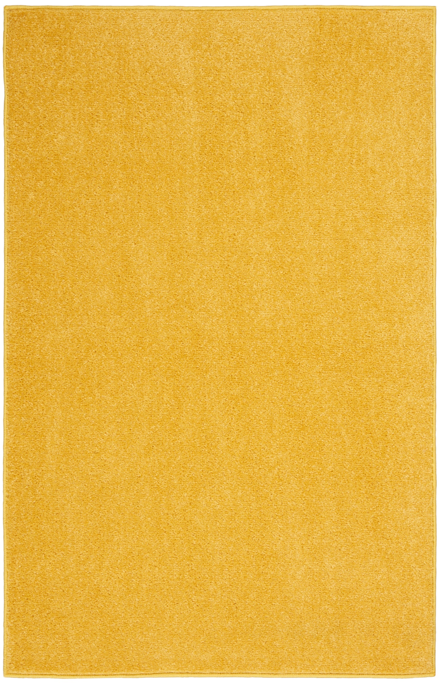 Solid golden-yellow rectangular outdoor rug, 2' x 4'.