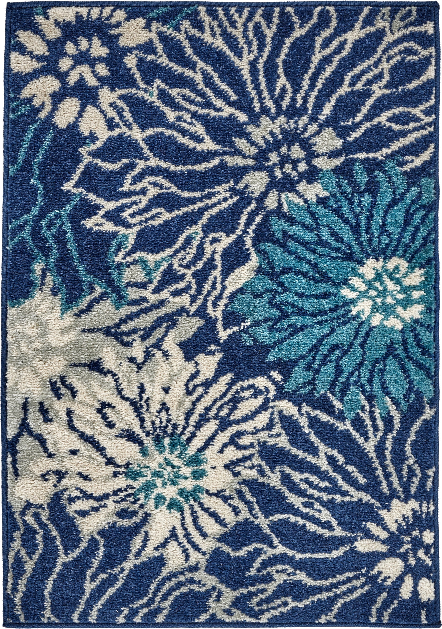 Rectangular navy shag area rug with large cream and turquoise floral blooms, plush pile.