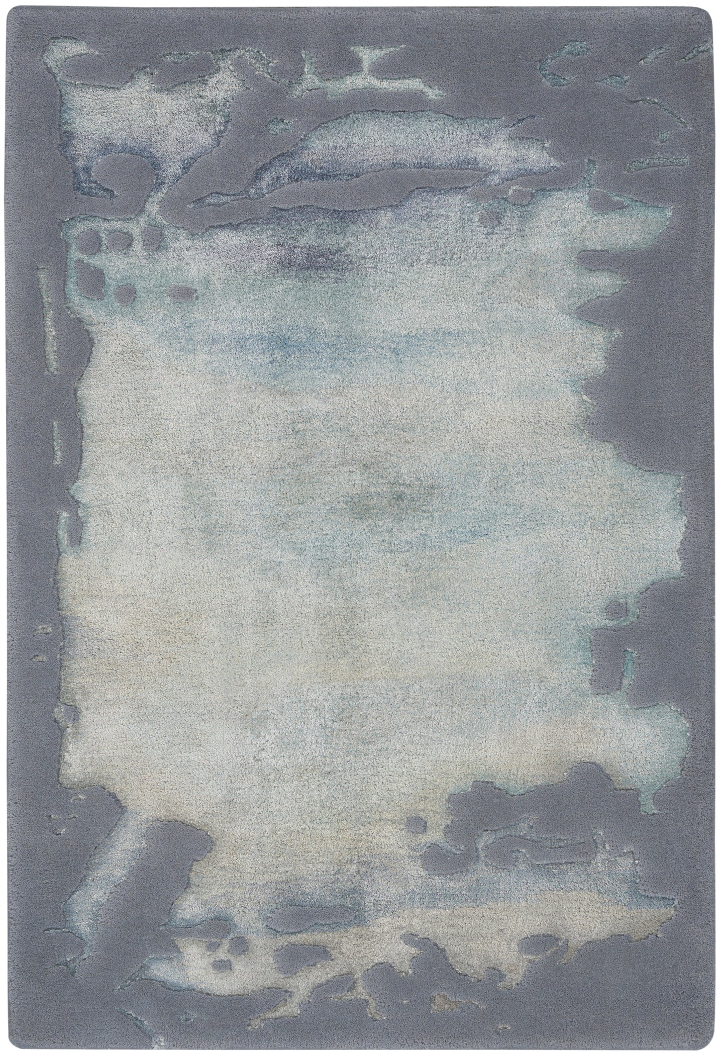 Abstract wash area rug with pale ivory center fading to blue, framed by blue-gray border; soft plush texture.