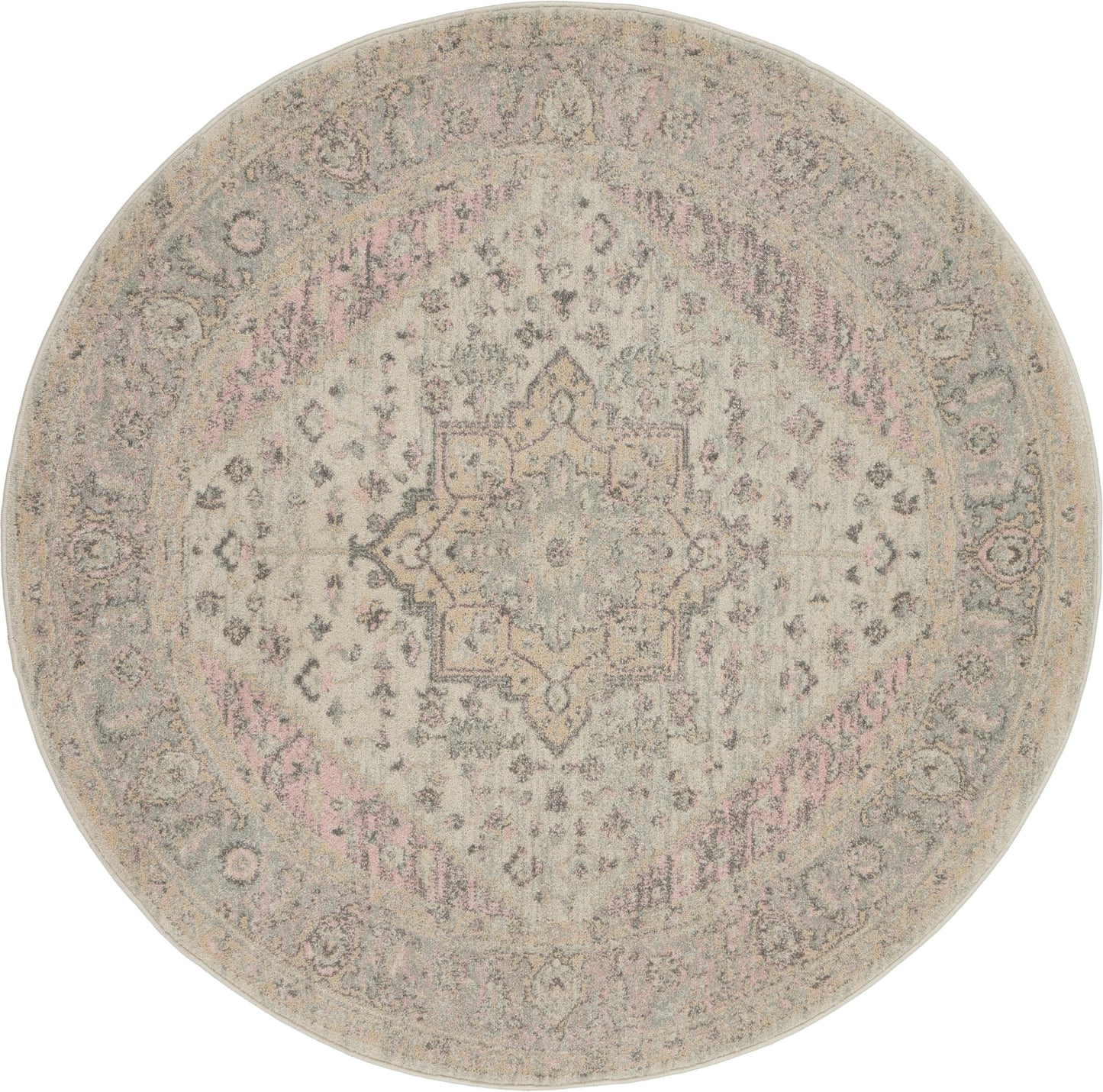 Round vintage-inspired Persian rug in beige-gray with pale pink accents and a delicate central medallion.