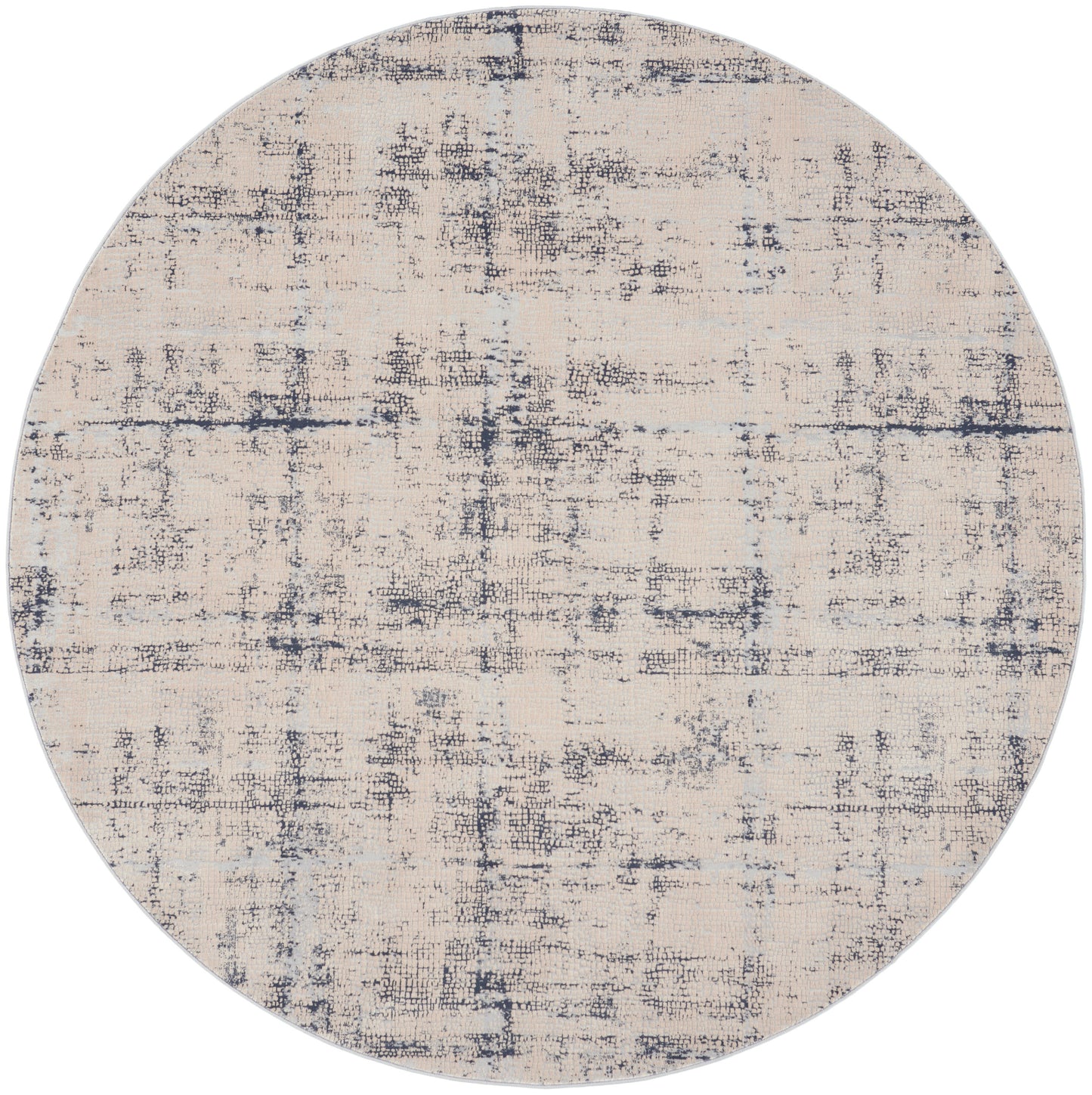 Round beige rug featuring a navy blue distressed abstract pattern; flat-weave, modern style.