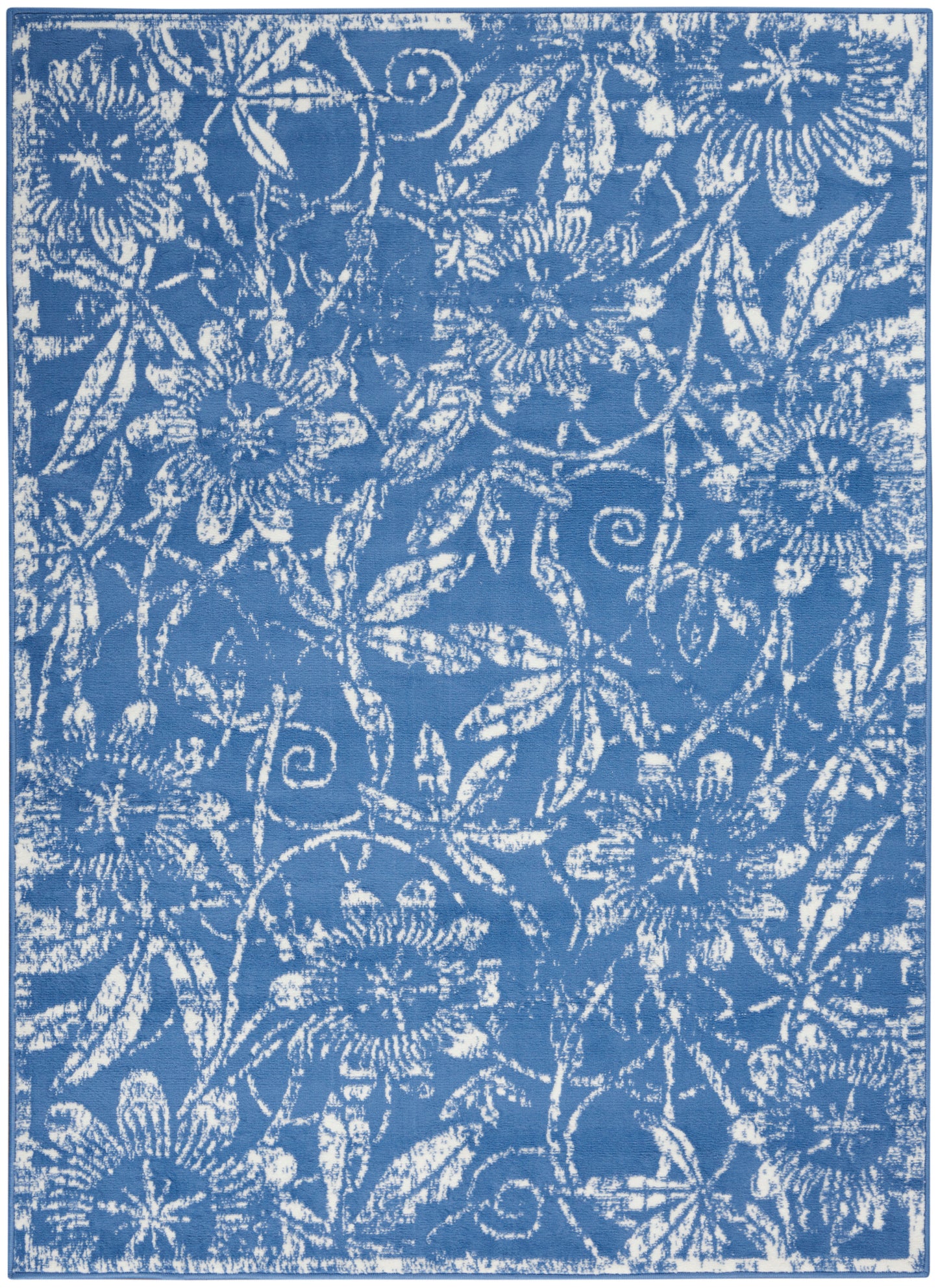 Rectangular blue rug featuring white floral damask pattern with intertwined vines.