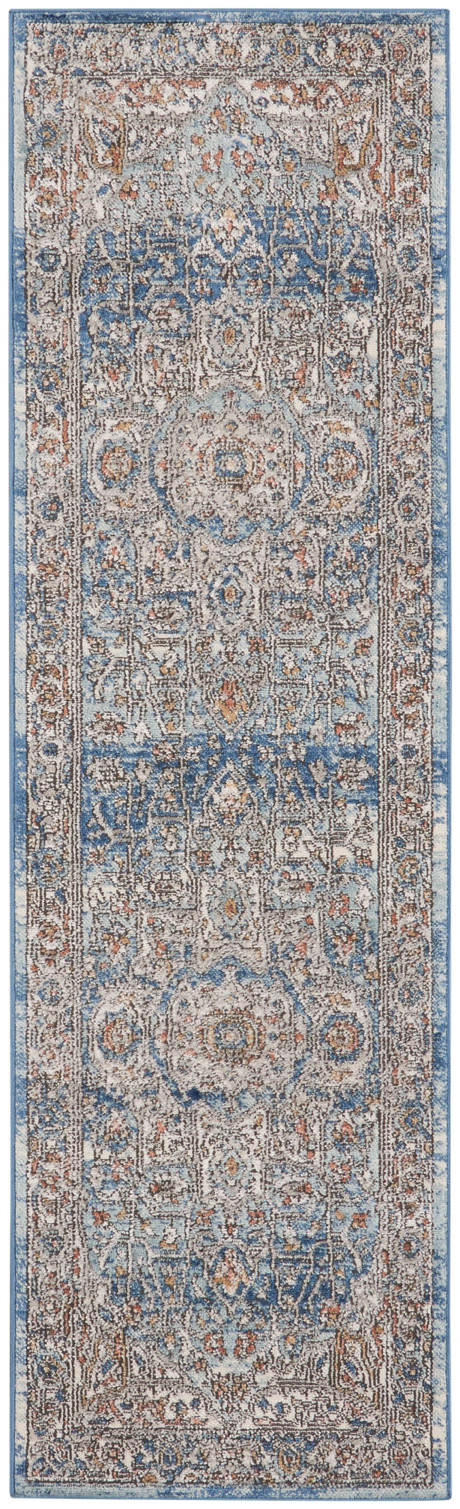 Ornate oriental-style runner rug, long narrow size, blue & beige with rust accents, intricate floral medallion pattern.