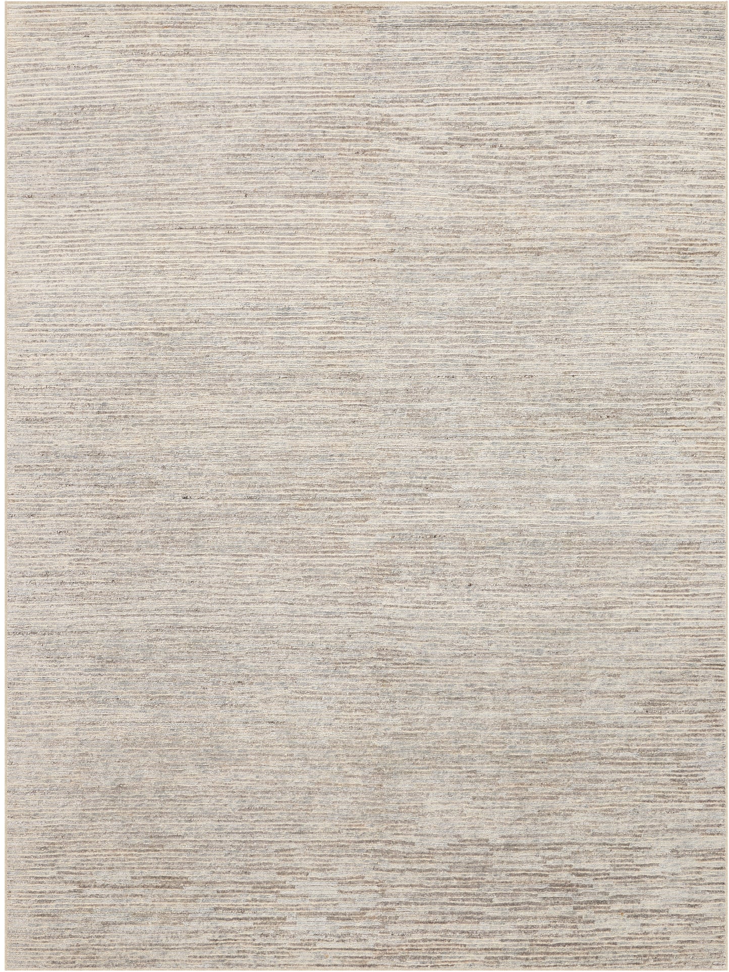 Beige-gray rectangular rug with a soft, textured surface and subtle horizontal banding; a versatile neutral decor piece.