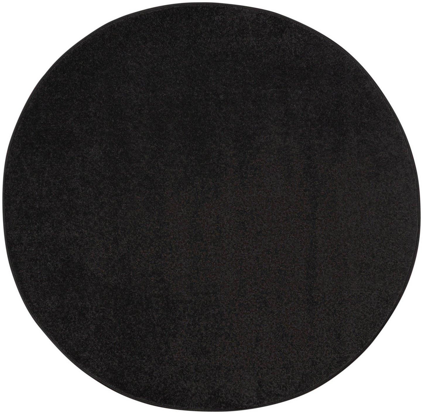Round black felt circle with textured surface, minimalist placemat.