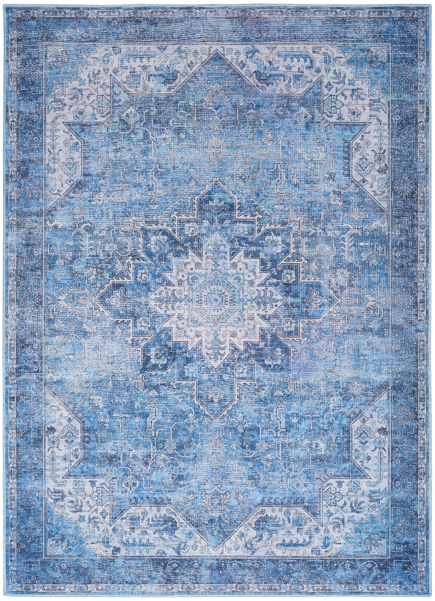 Blue distressed oriental rug with central medallion and intricate border in ivory and lighter blues; vintage faded look.