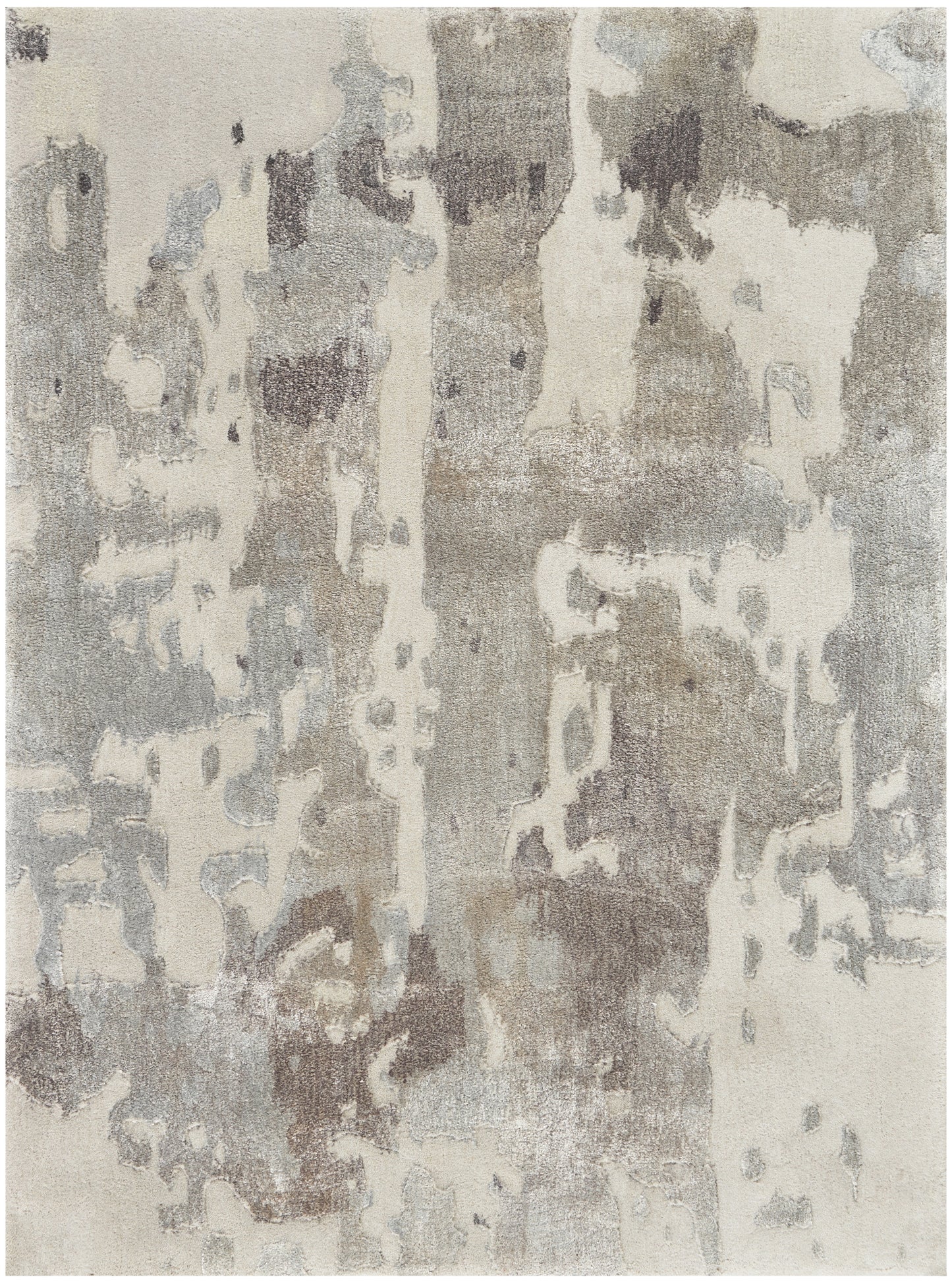 Abstract neutral area rug with beige, taupe, gray and ivory patches in a distressed pattern.