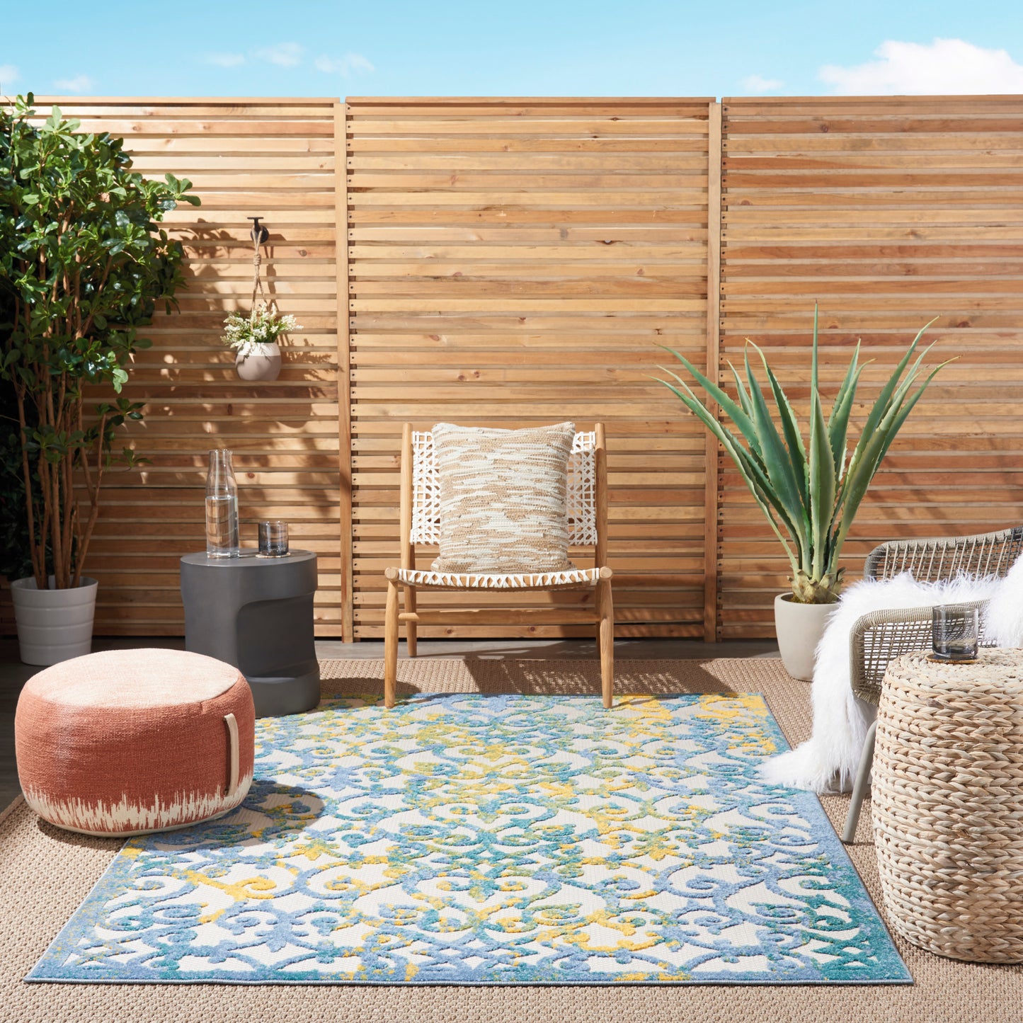 Blue-yellow patterned contemporary rug, 5' x 8'.
