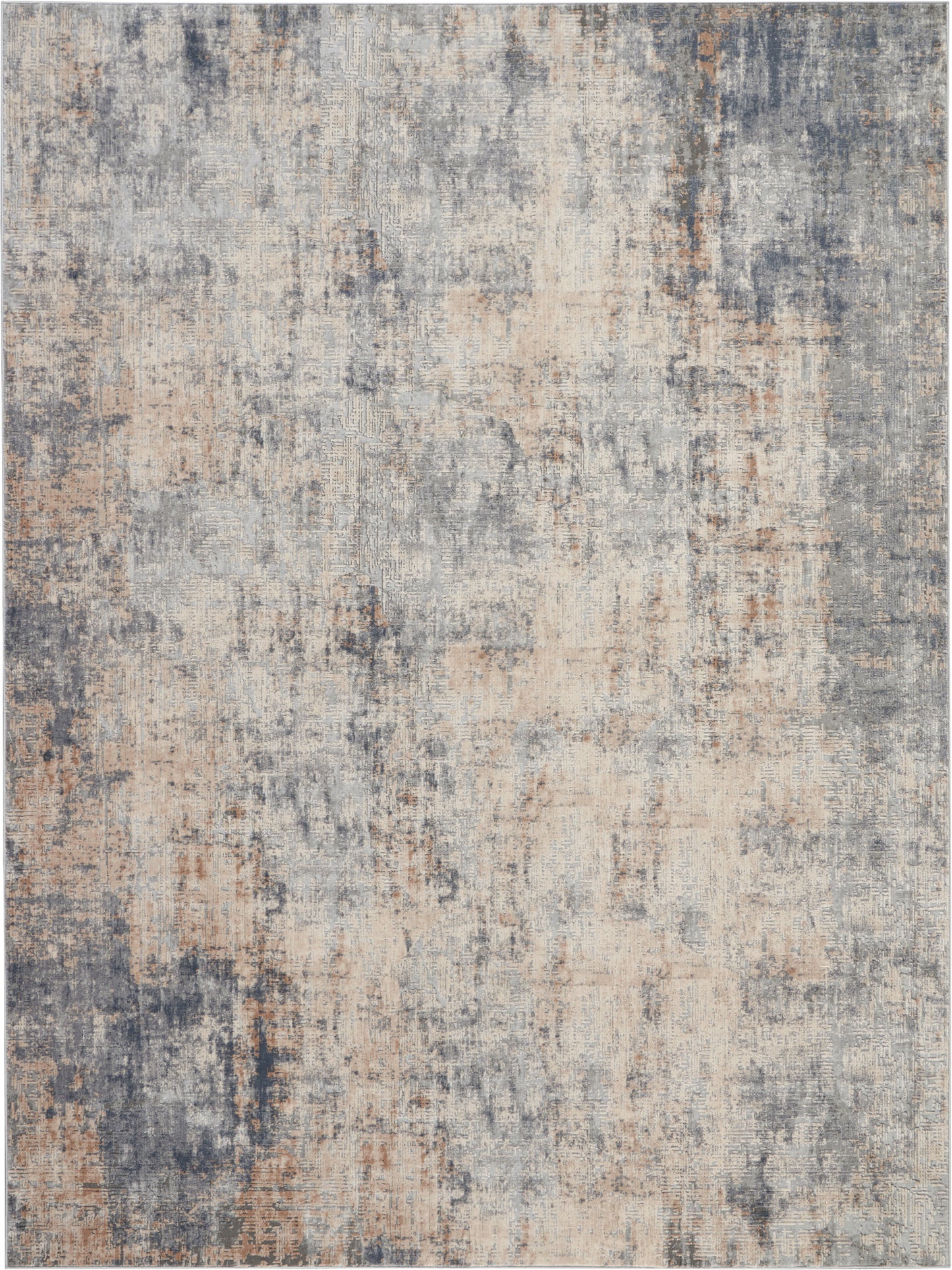 Abstract distressed area rug in blue, gray and beige tones with a muted, vintage-inspired pattern.