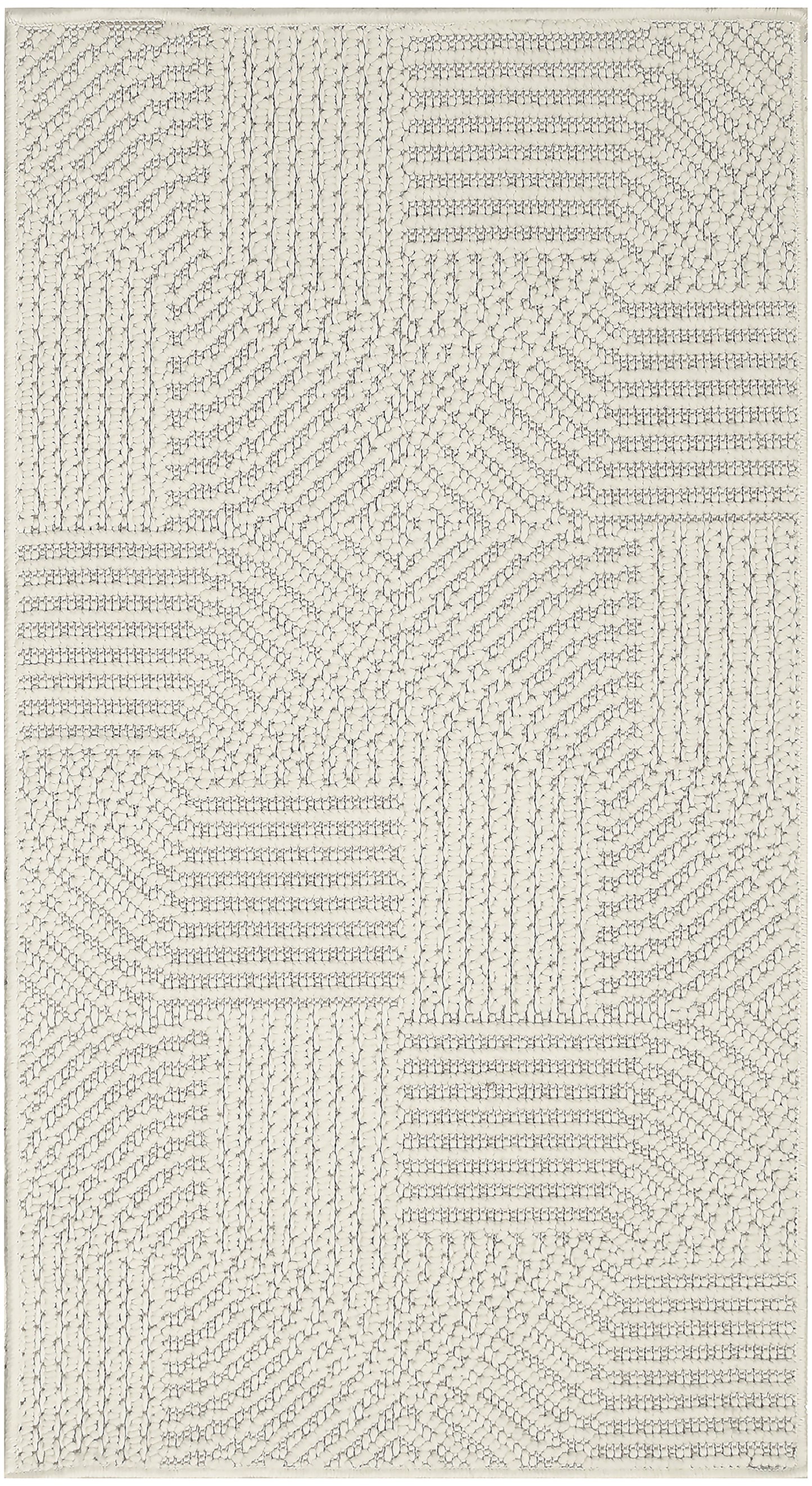 Cream textured area rug with a raised loop geometric patchwork in rectangular blocks.