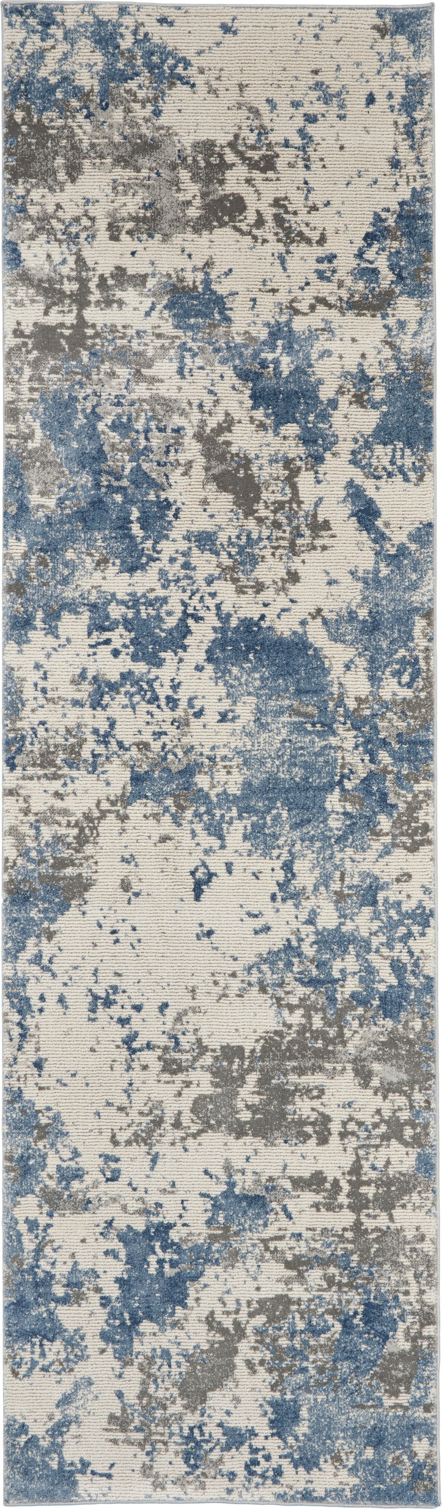 Abstract blue, gray and beige runner rug with irregular blotch pattern; modern distressed style.