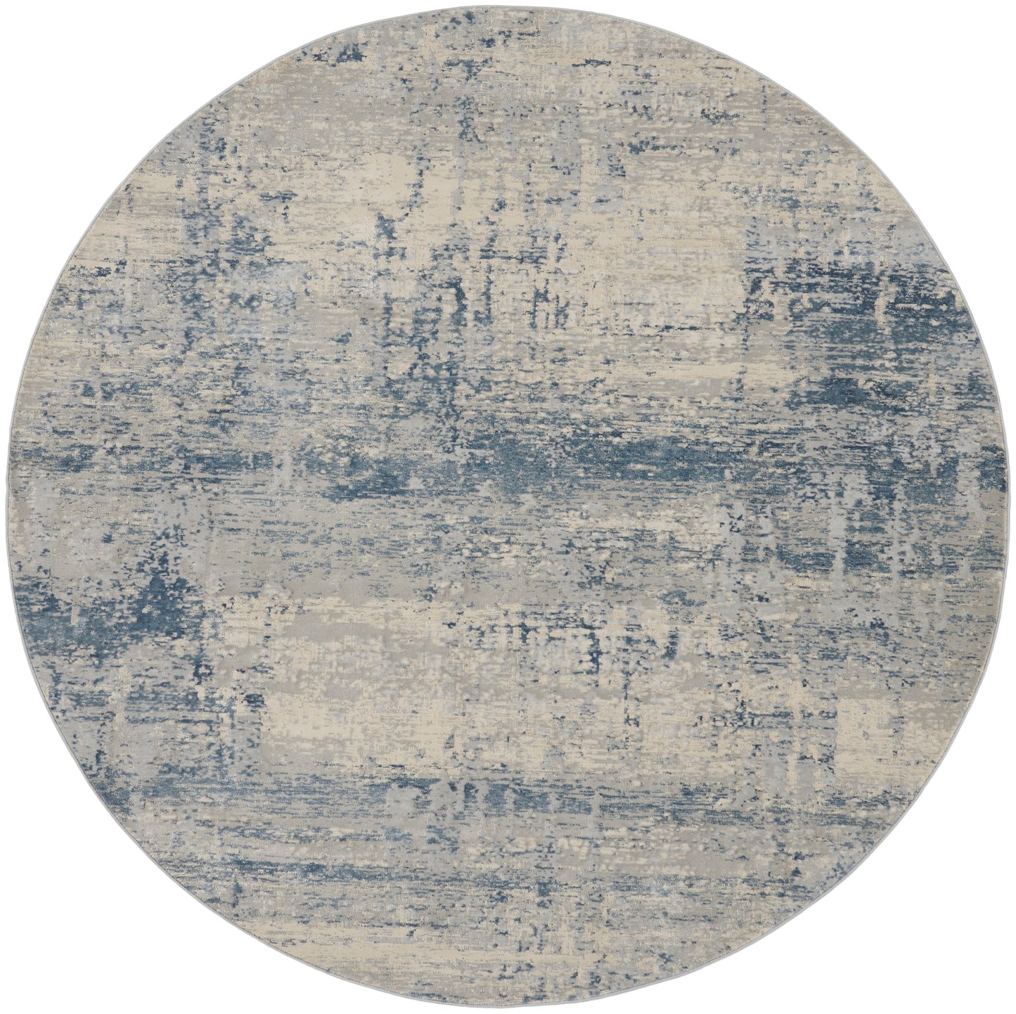 Round area rug in blue and beige with distressed abstract pattern, modern coastal decor.