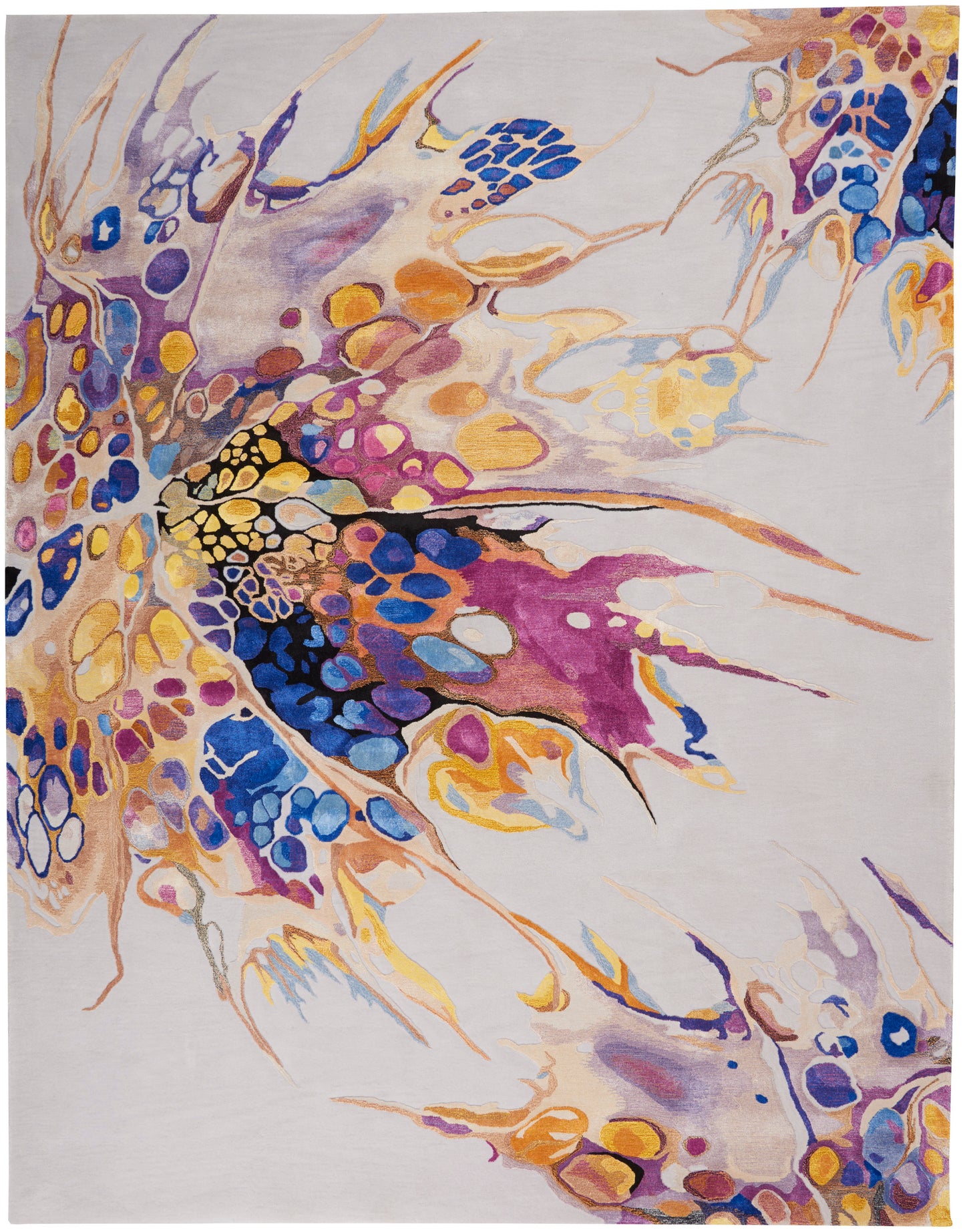 Abstract multicolor area rug featuring pebble-like shapes in yellow, blue, purple, orange on a light gray background.