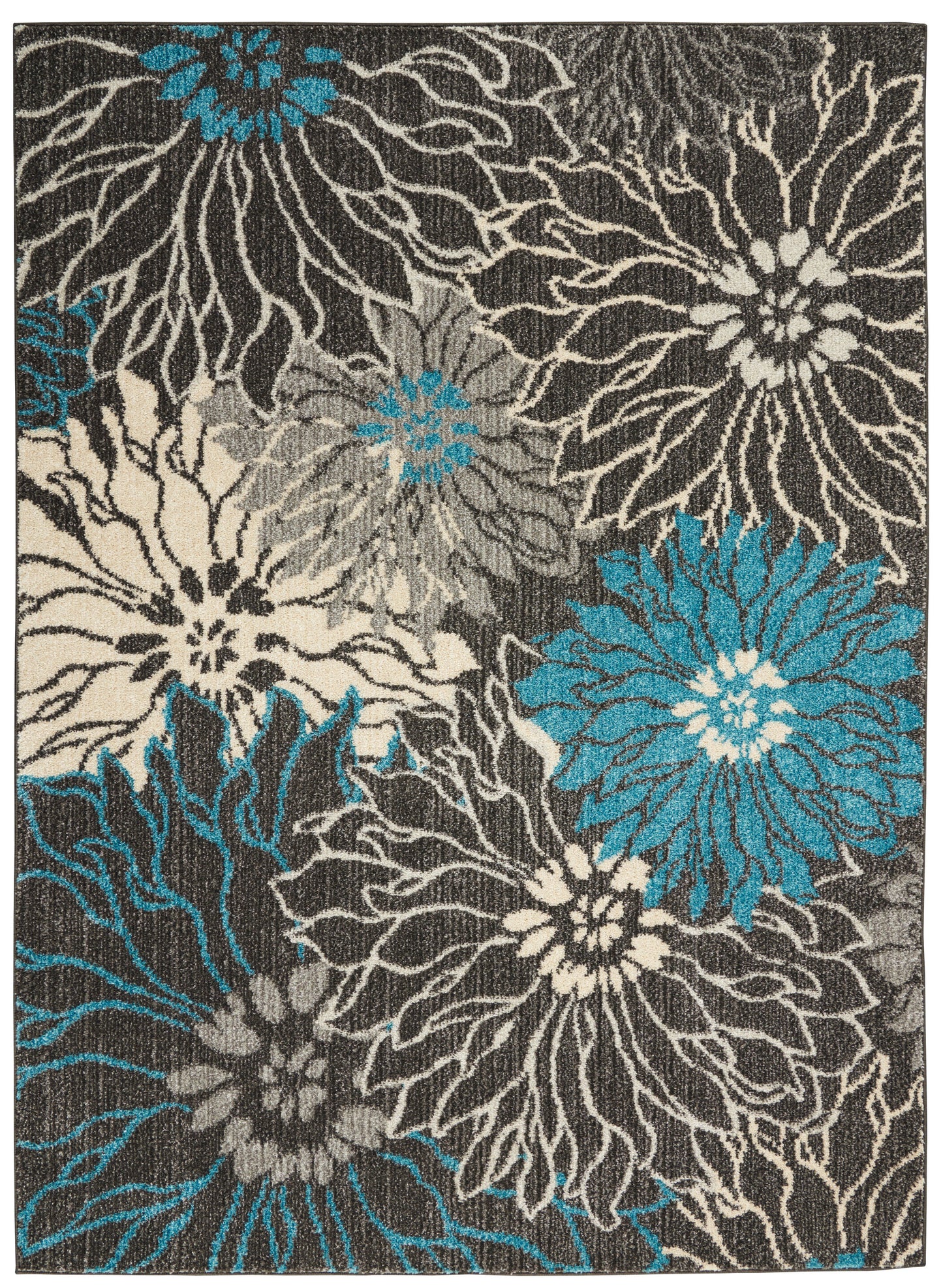 Shaggy area rug with large cream, teal and gray floral motifs on a charcoal background