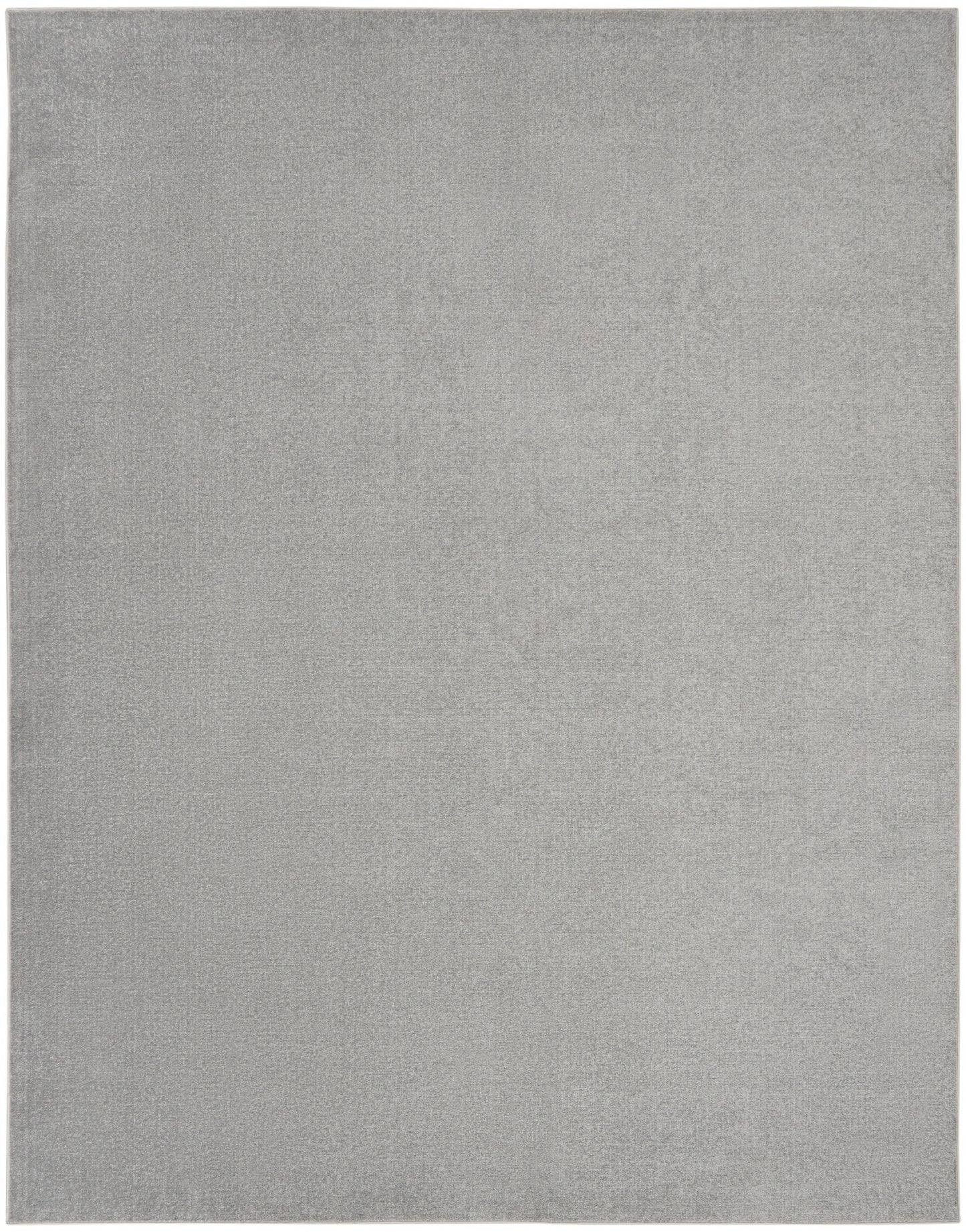 Light gray outdoor rectangular rug with plush, velvet-like pile and subtle sheen.