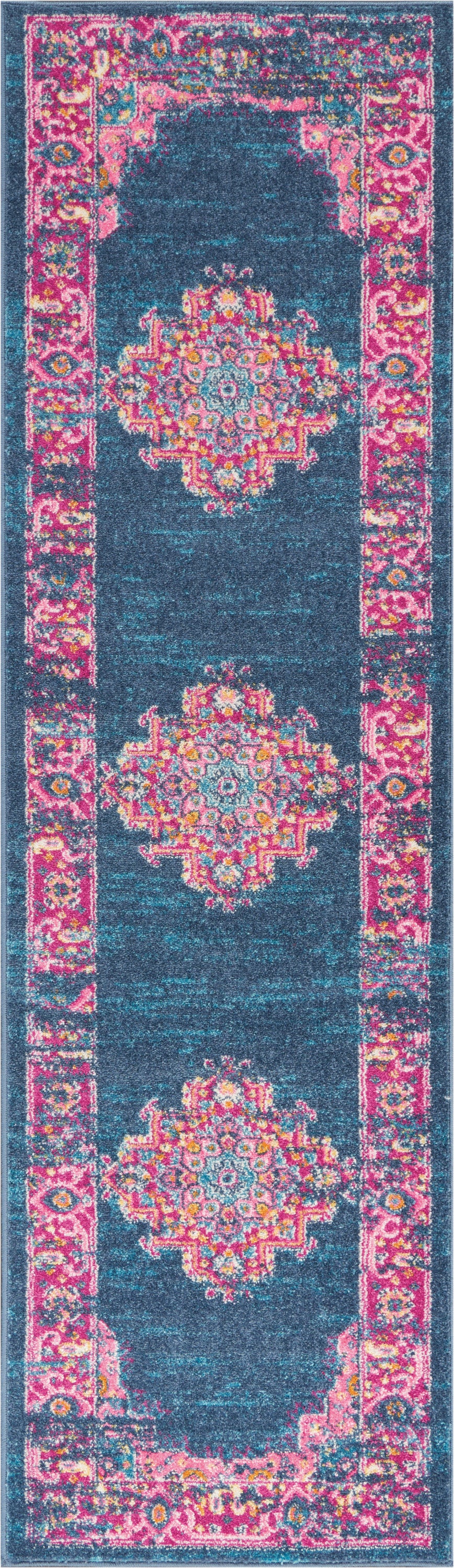 Teal field distressed runner rug with pink ornate border and three colorful central medallions.