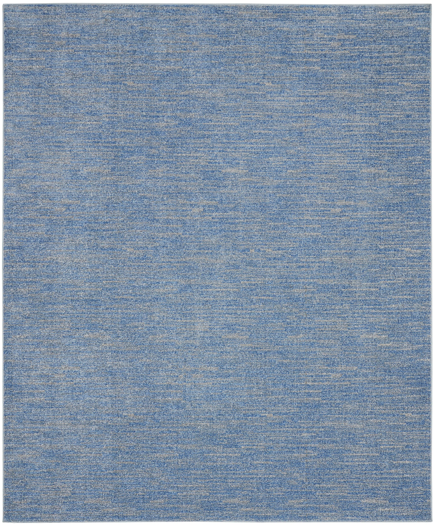 Blue heathered area rug with subtle variegated blues and soft woven texture, modern living room floor covering.