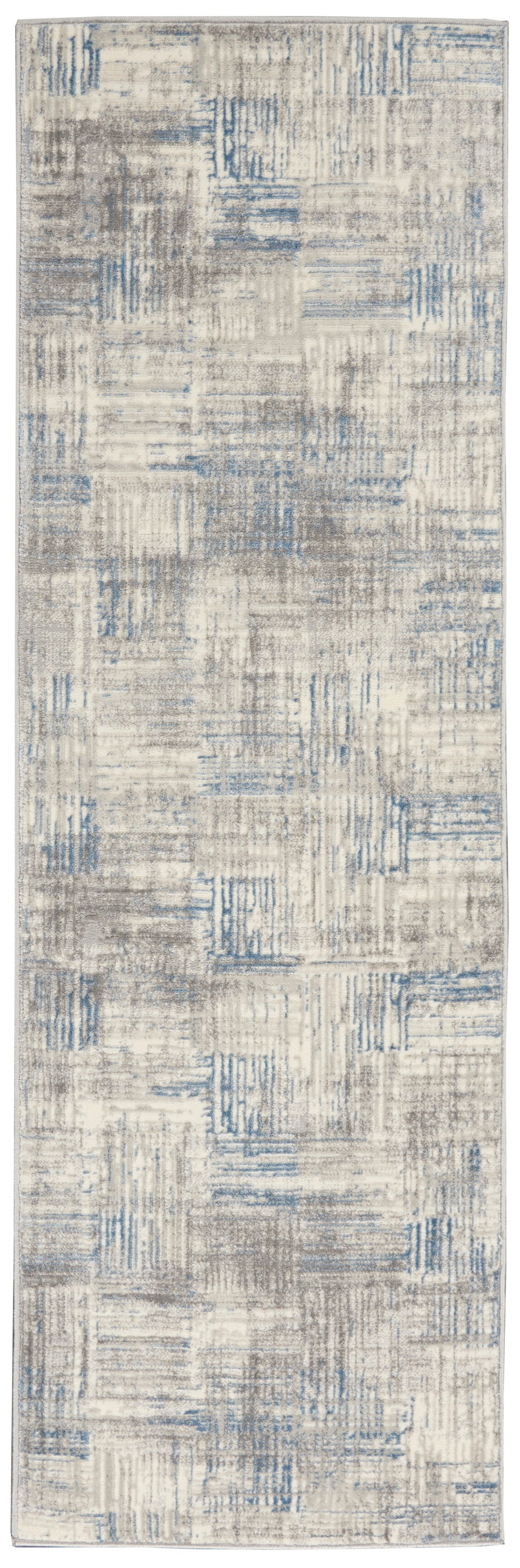 Rectangular abstract area rug in beige, gray and blue with a distressed patchwork pattern; modern living room decor.