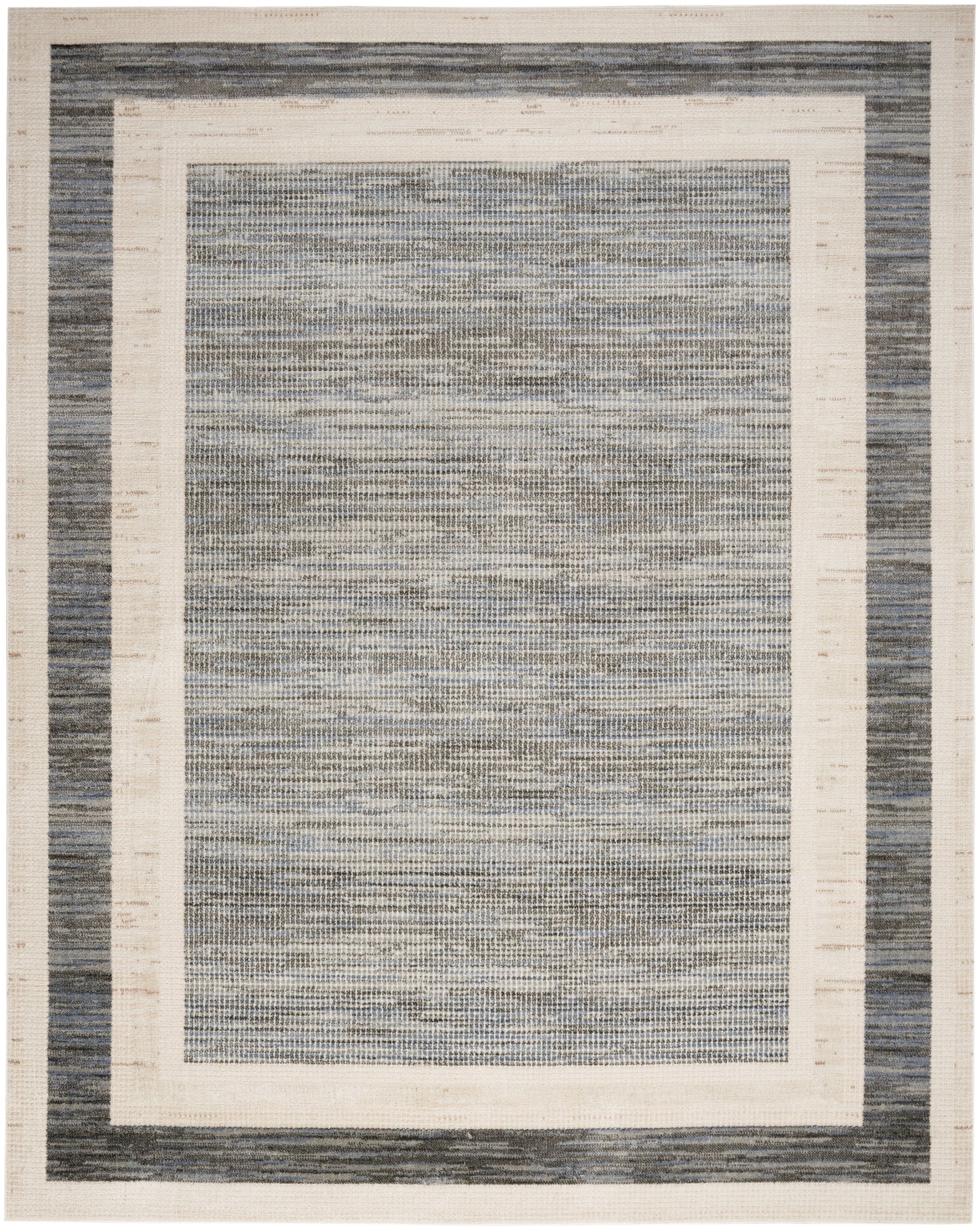 Rectangular woven area rug with navy blue outer border, cream inner frame, and a blue-gray textured center.