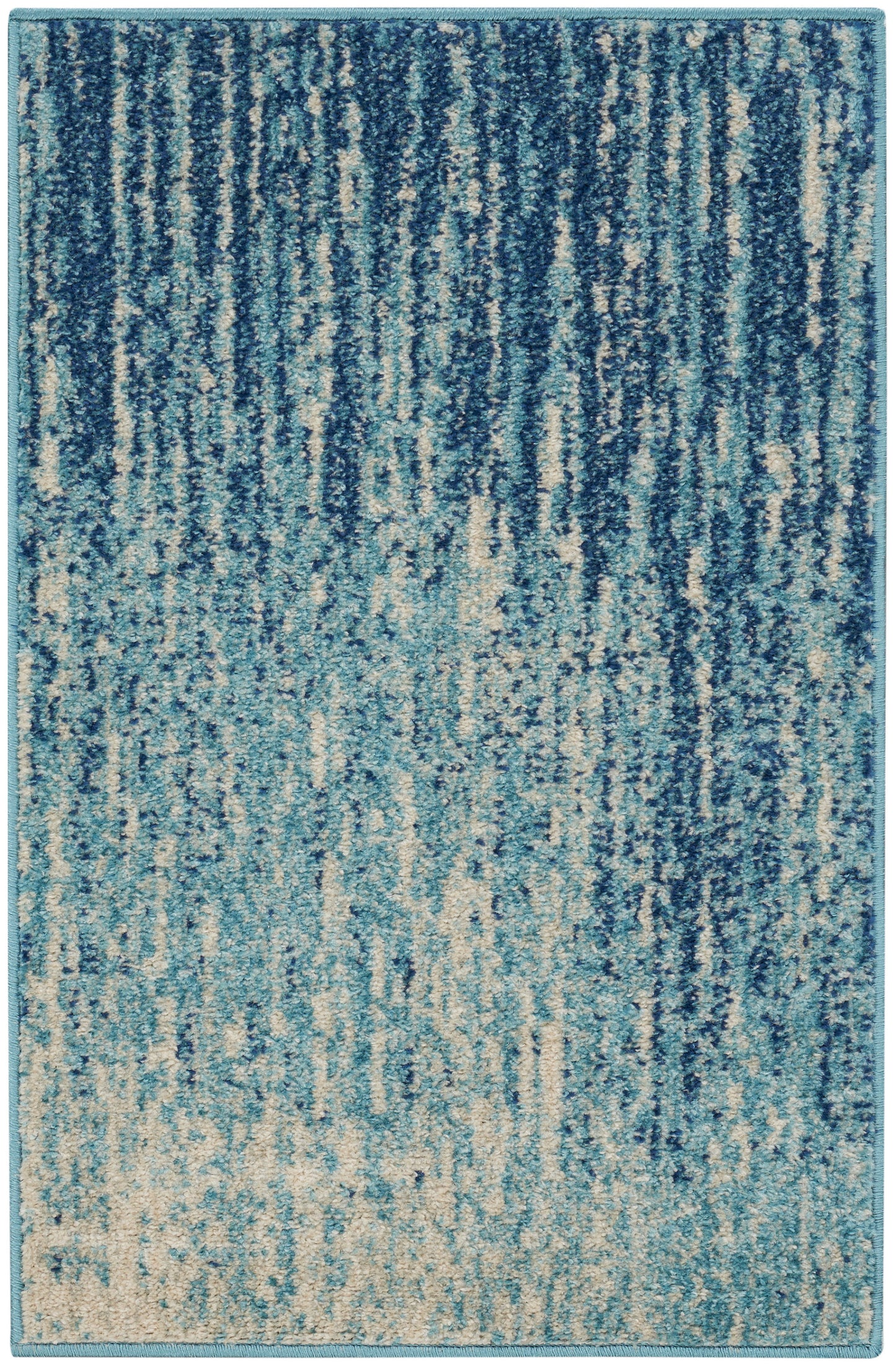 Blue abstract area rug with turquoise border; gradient vertical streaks from navy to aqua, plush textured.