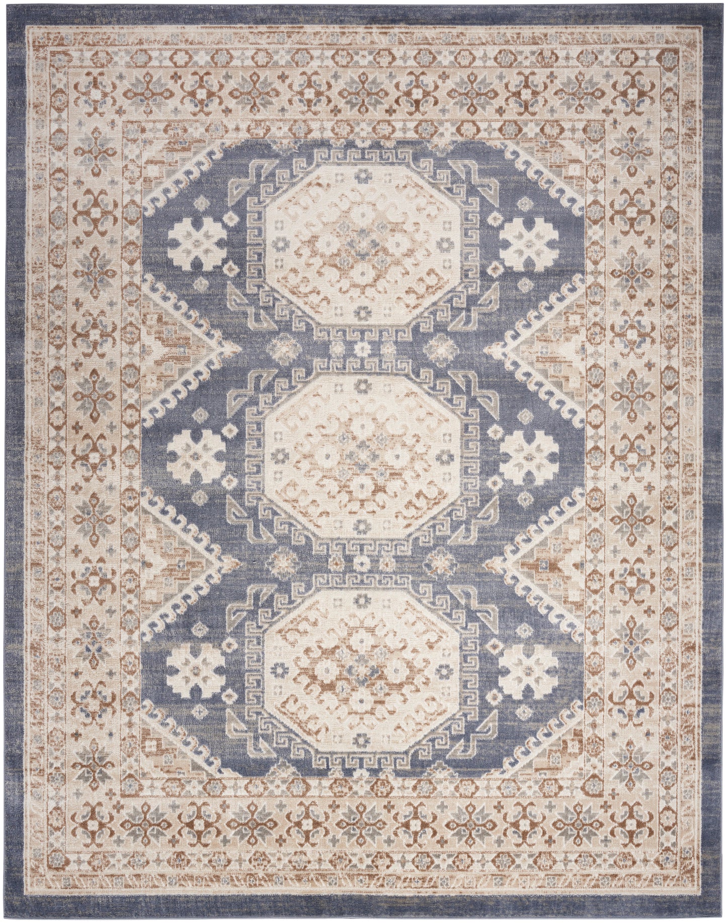 Blue and ivory oriental rug featuring three ivory octagonal medallions, tan floral border, Persian-inspired vintage design.