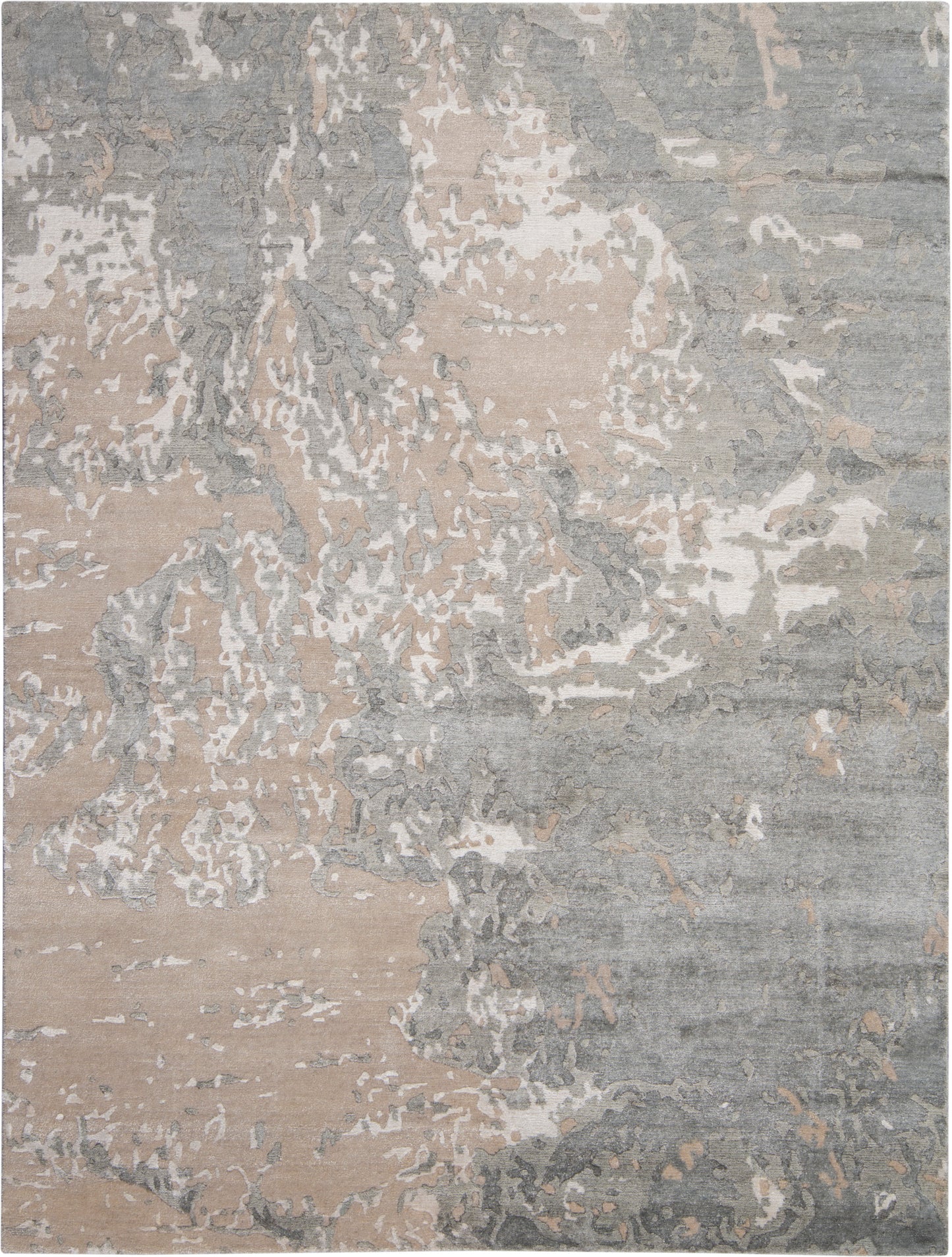 Abstract distressed area rug in beige, taupe & gray with soft, plush pile for modern living spaces.