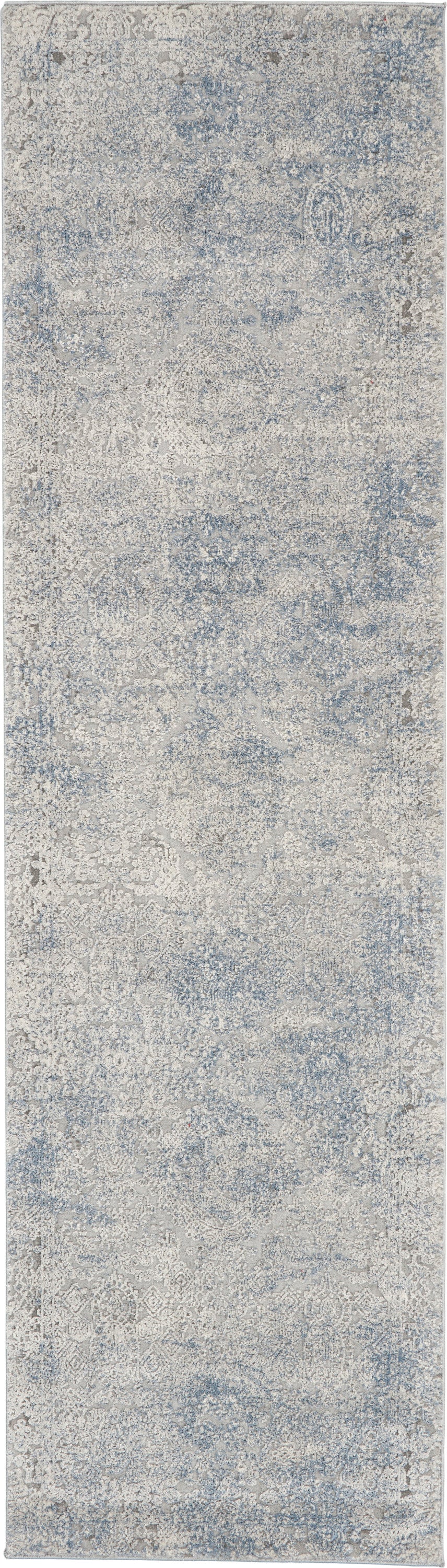 Blue-gray distressed antique-pattern rug runner with ivory motifs; vintage oriental style.