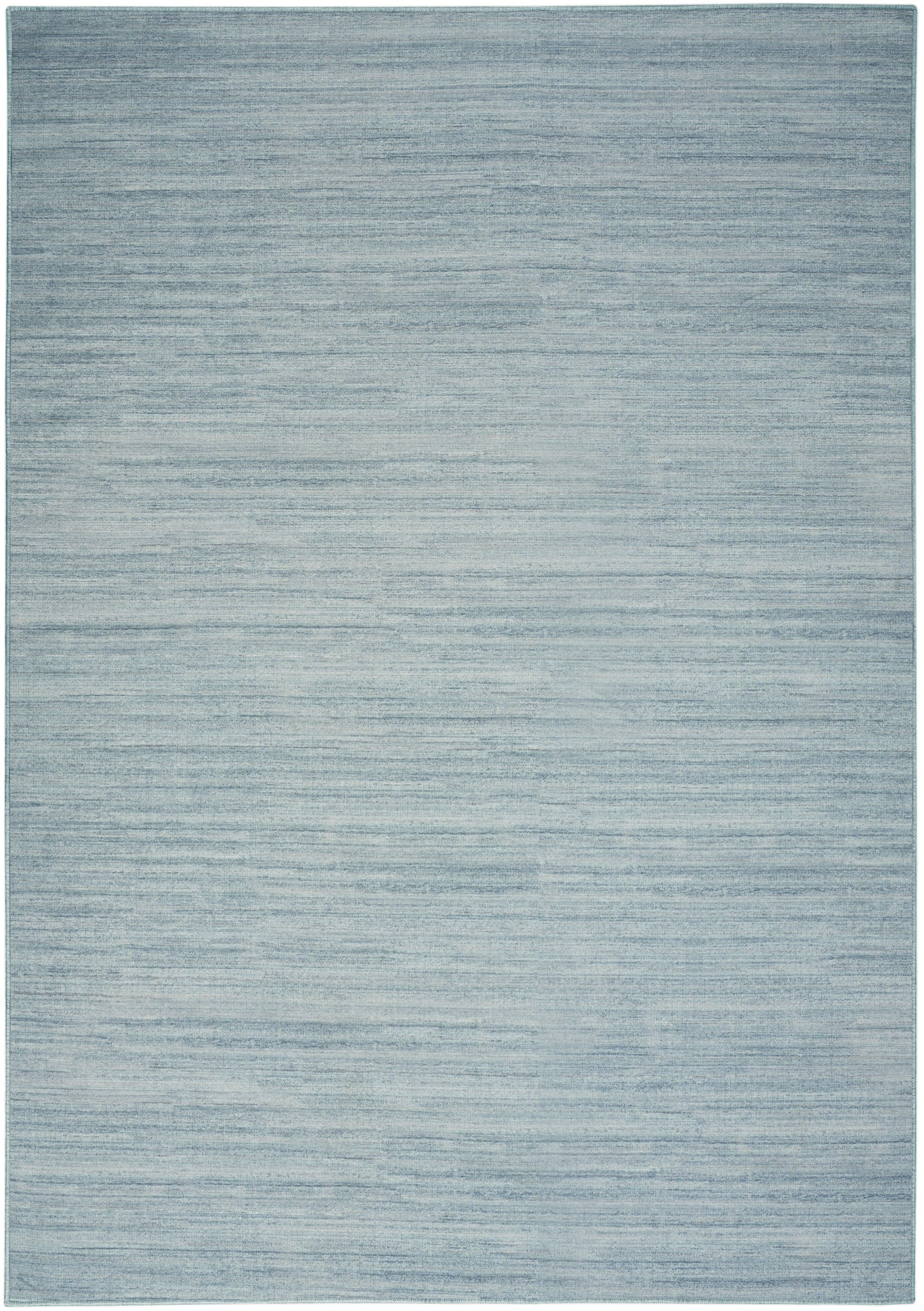 Light blue-gray area rug with subtle, brushed texture and soft, low-pile look; modern rectangular design.