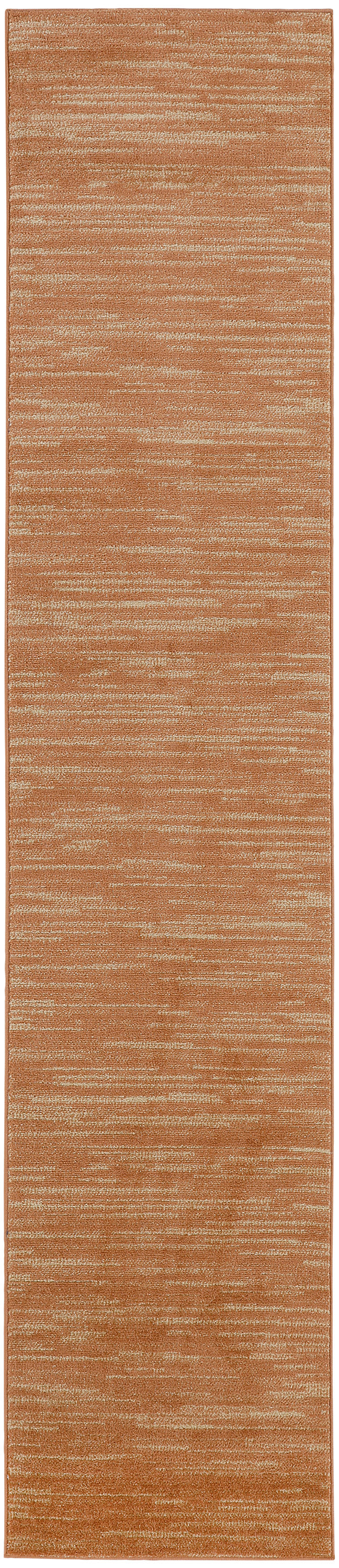 Warm orange-brown textured outdoor runner rug with beige flecks.