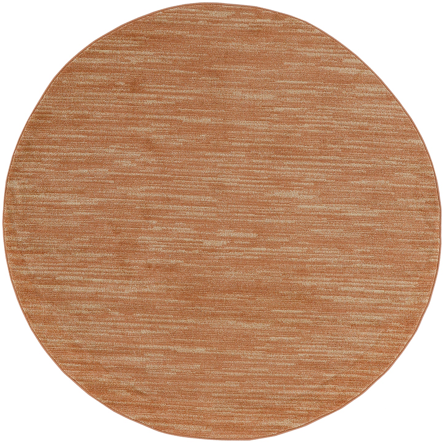 Round copper-orange outdoor rug with brushed metallic texture.
