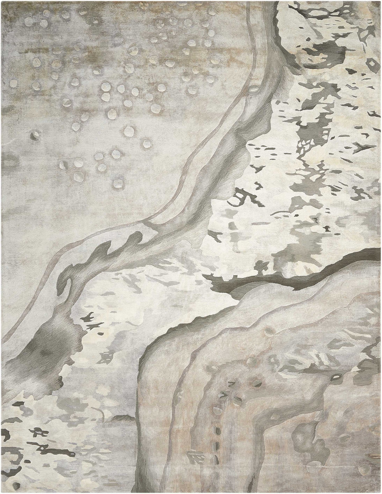 Abstract coastal area rug in soft beige, taupe and gray with flowing shoreline-like curves.