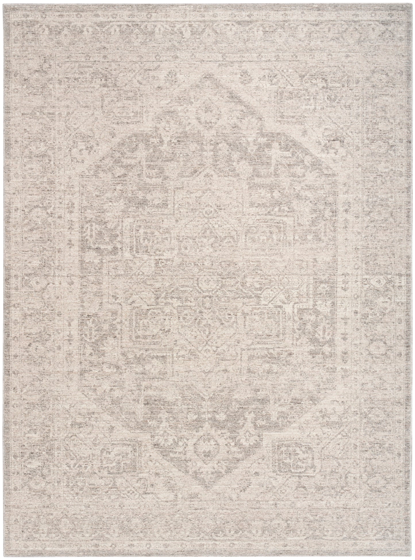 Rectangular rug with a faded beige-gray oriental pattern, central medallion, soft vintage look.