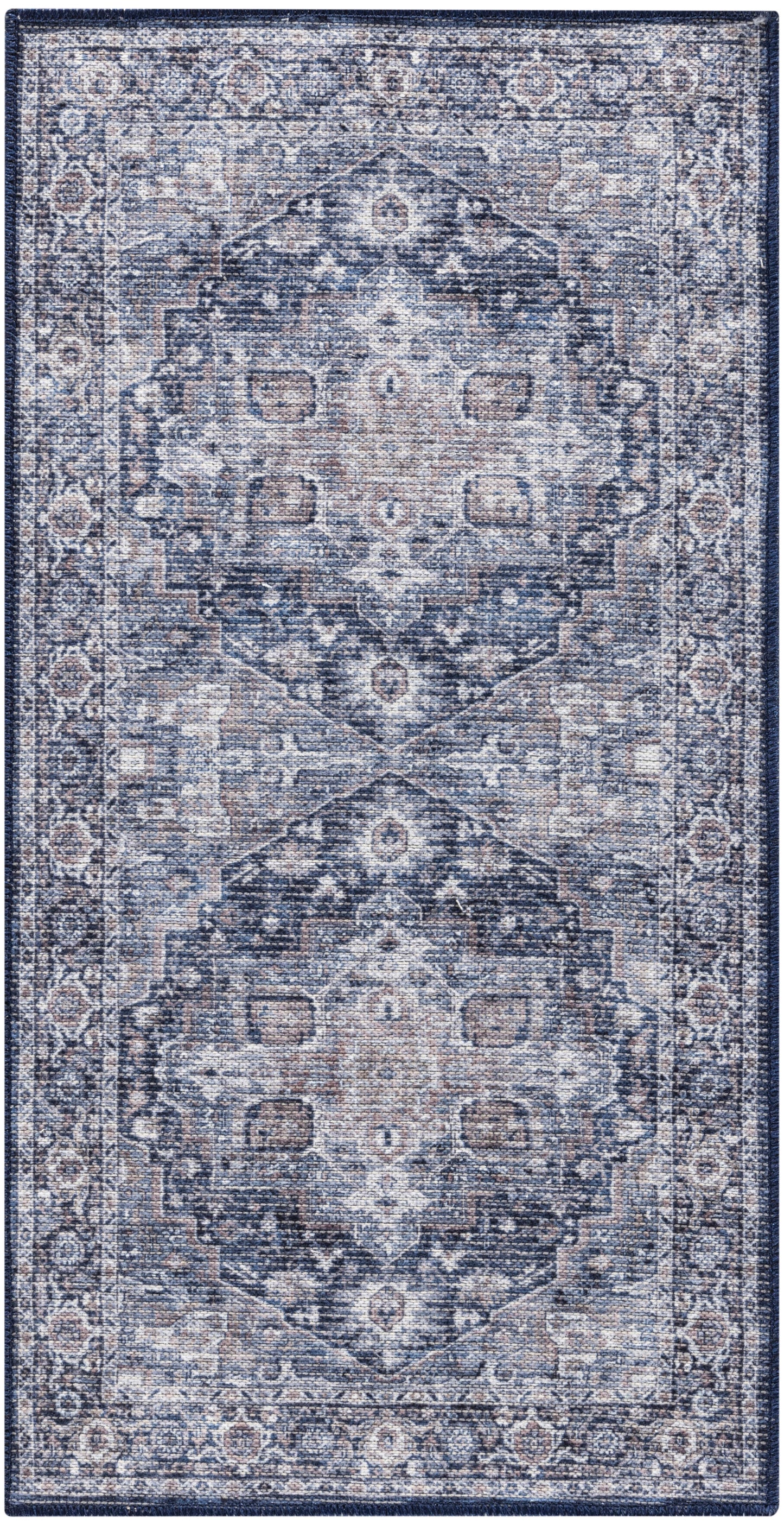 Rectangular blue distressed oriental rug with ivory and beige central medallion and ornate border.