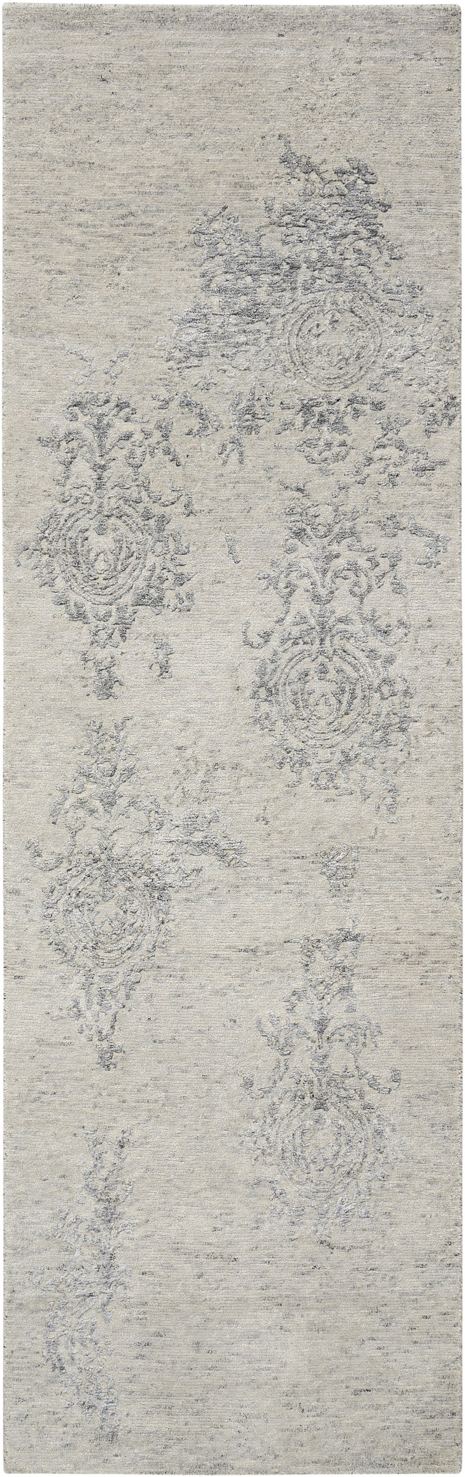 Light gray-beige distressed runner rug with muted ornate damask medallions and scrollwork.