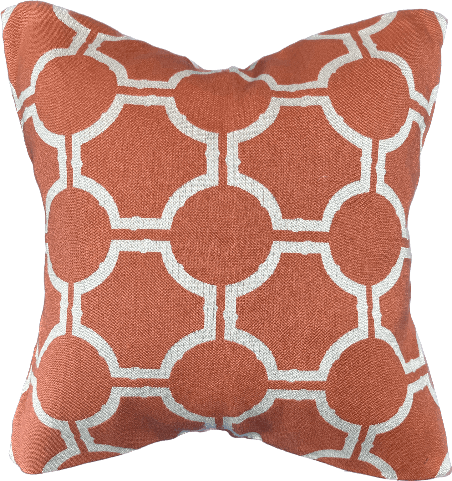 Terracotta square pillow cover with a geometric white pattern featuring circles and octagons, textured fabric.