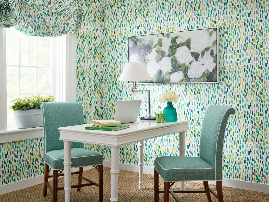 Elegant interior design featuring matching wallpaper and fabric creating a cohesive, designer-style room with coordinated textiles