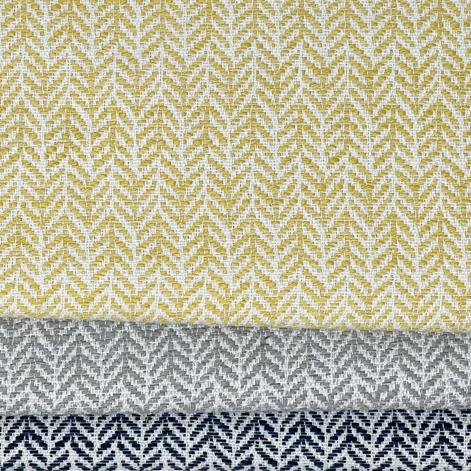 Curated selection of  Bella Dura Home  performance fabrics showcasing various textures and patterns. Primoends. Home Decor to Go